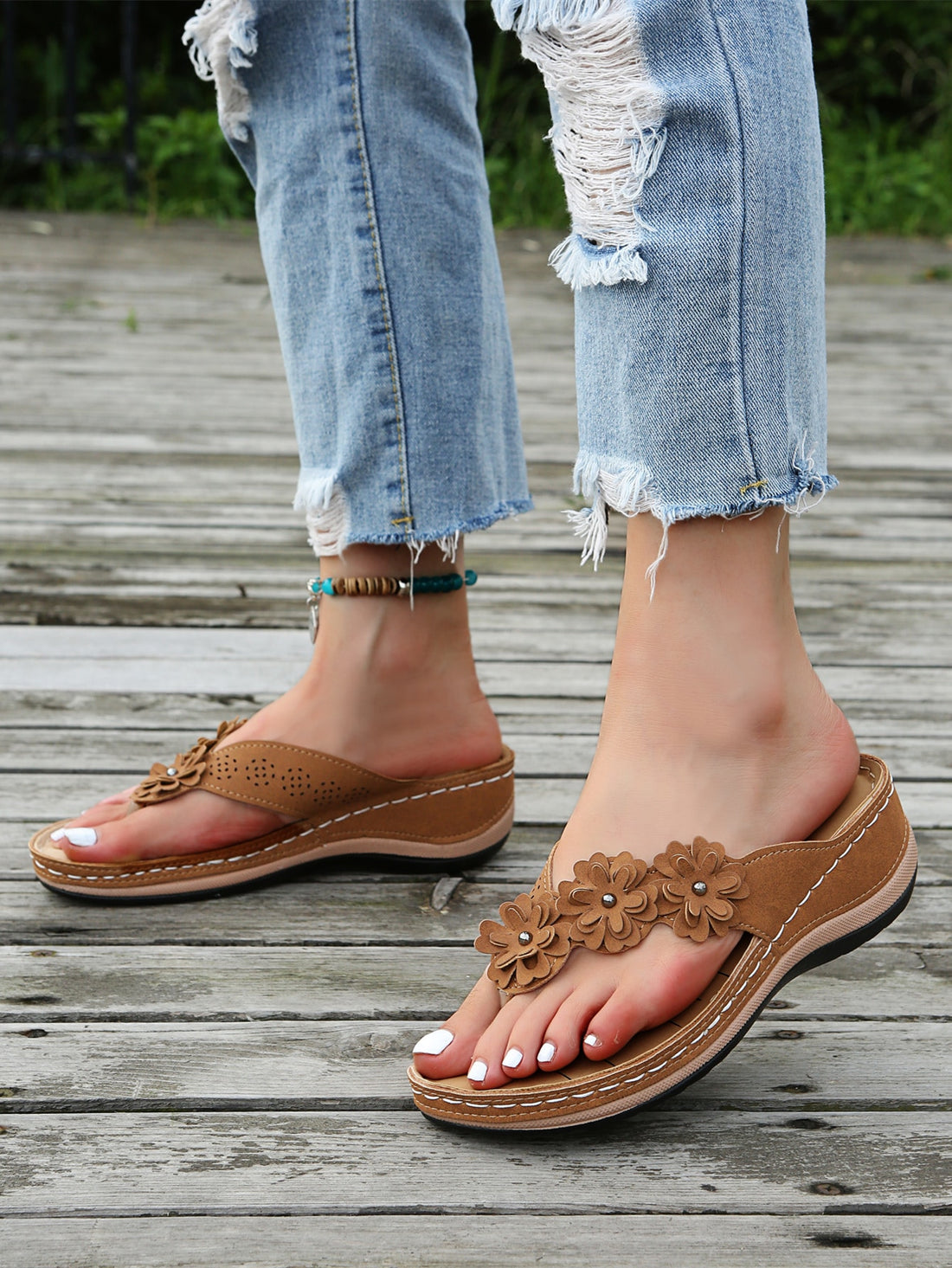 Women's floral stitching pointed-toe wedge flip flops with thick sole, toe-post design, and rhinestone detail