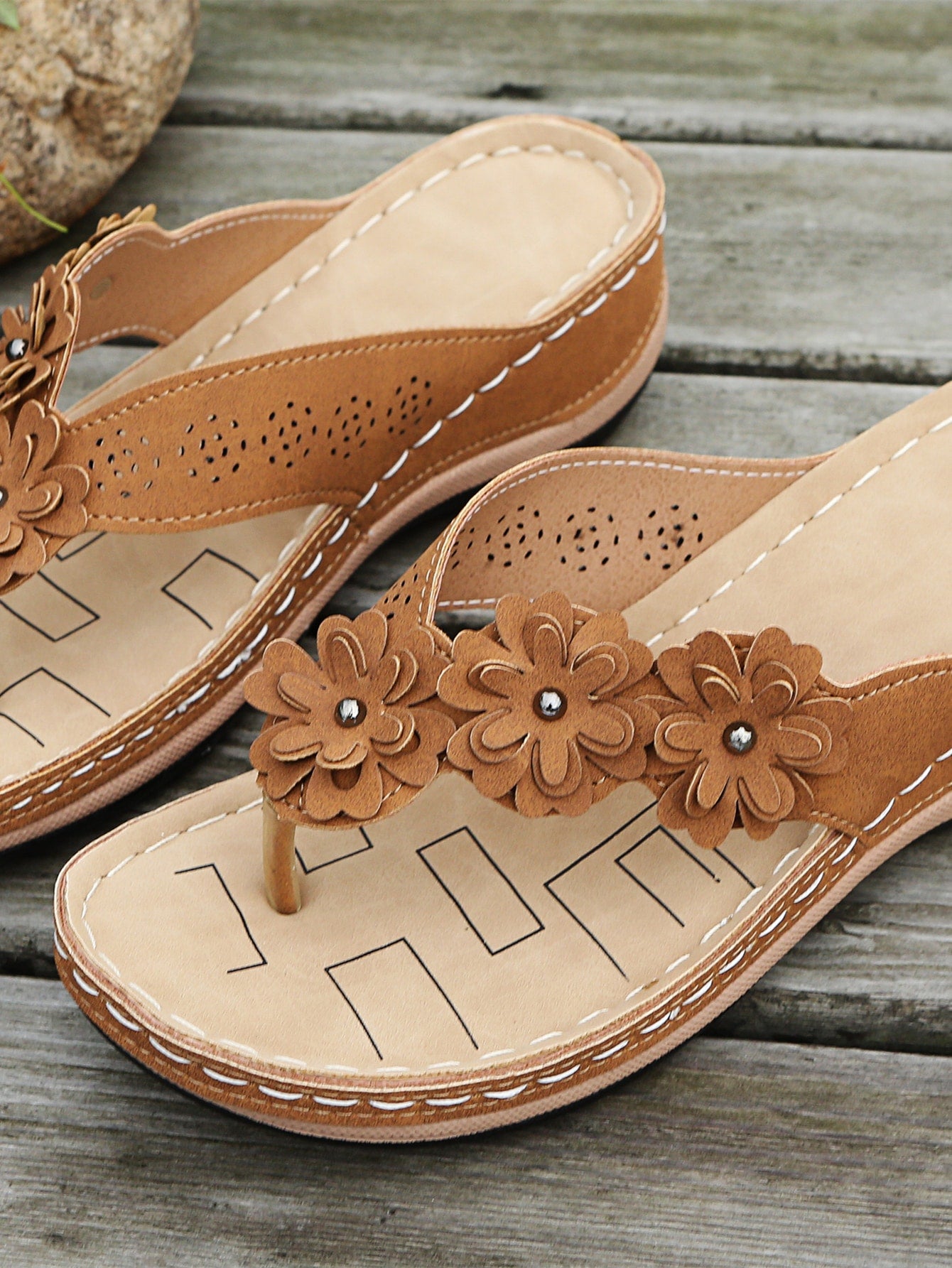 Women's floral stitching pointed-toe wedge flip flops with thick sole, toe-post design, and rhinestone detail