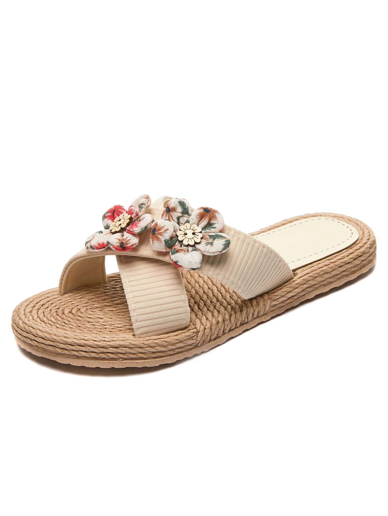 Women’s colorblock cross strap slide slippers with flower applique decor and open toe, flat sole design for beach and outdoor use.