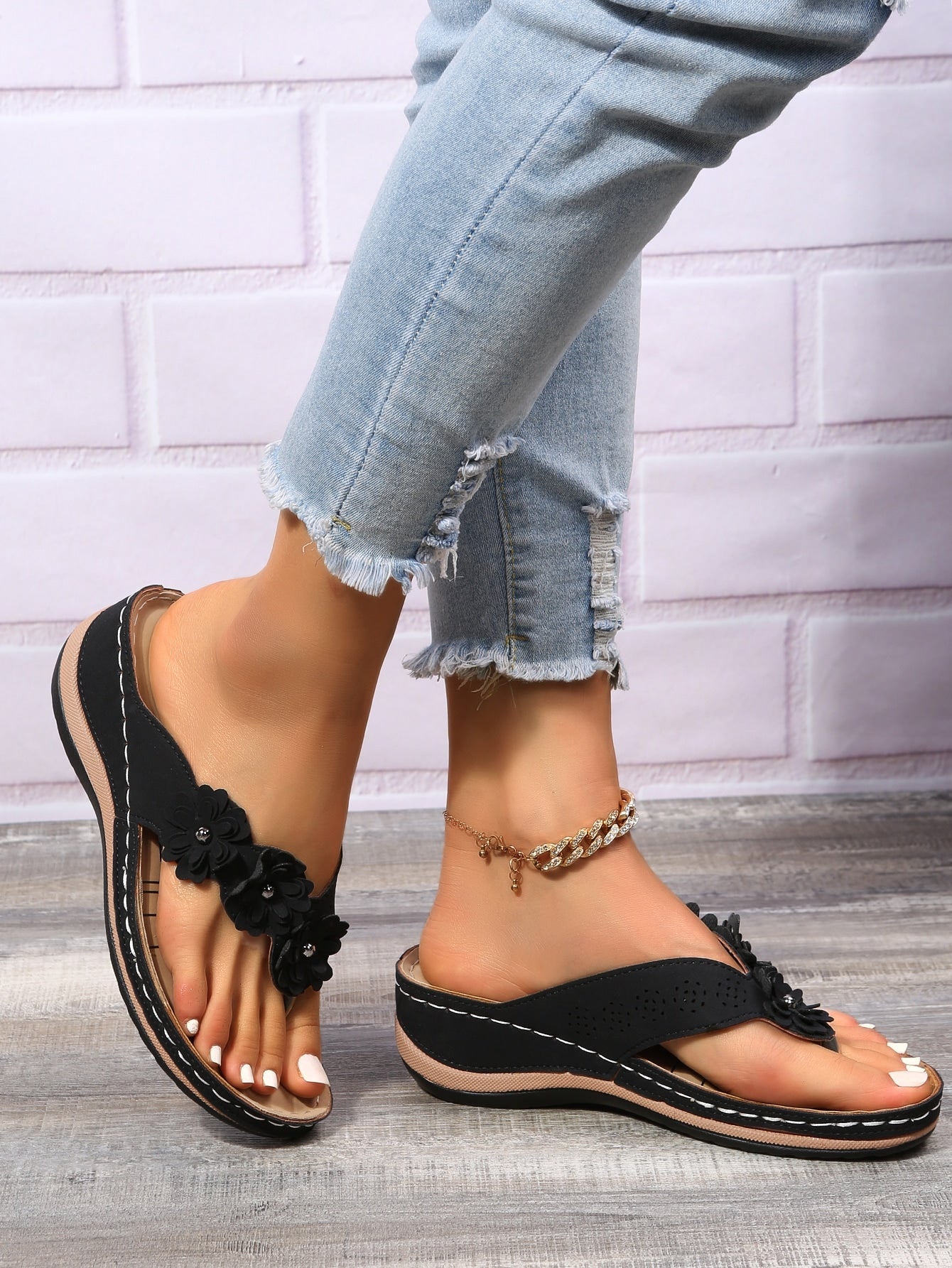 Women's floral stitching pointed-toe wedge flip flops with thick sole, toe-post design, and rhinestone detail