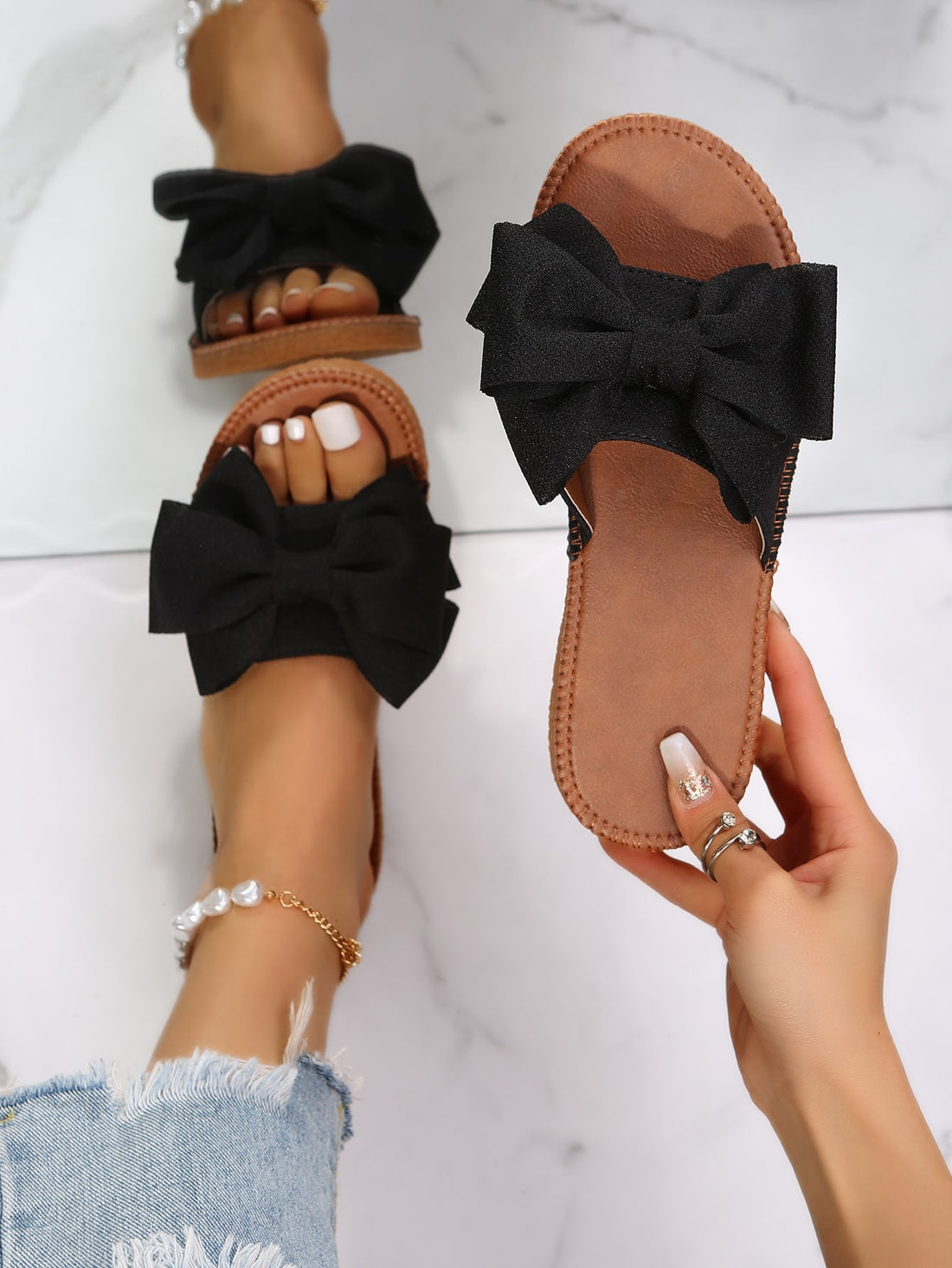 Women’s flat slide sandals with bowknot detail, open toe, and slip-on design