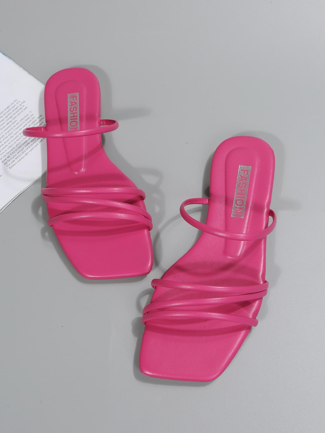 Casual striped flat slide sandals with beaded detail and open toe, beach-style slip-on design.