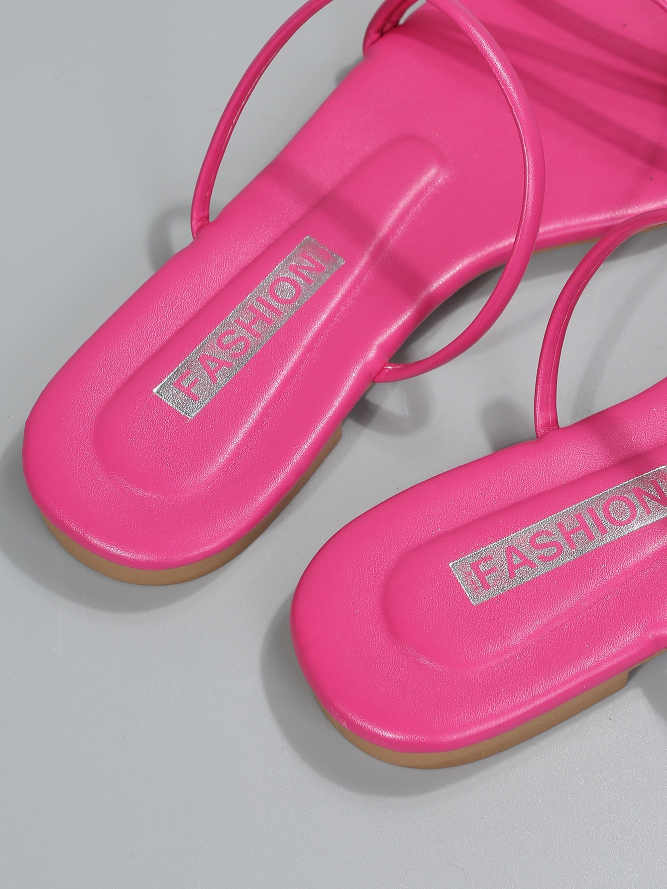 Casual striped flat slide sandals with beaded detail and open toe, beach-style slip-on design.