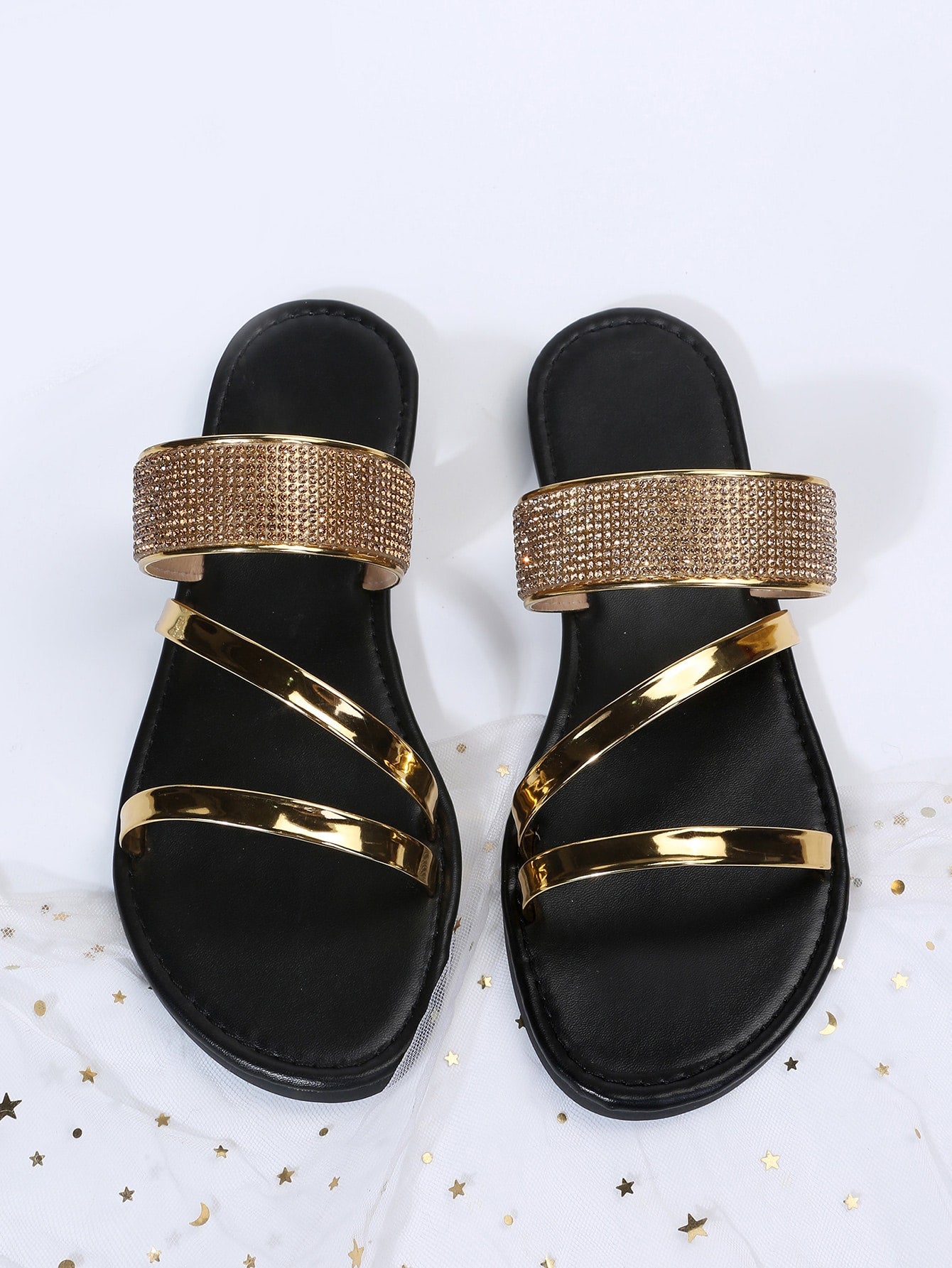 Women's gold thong flat slide sandals with rhinestone detail, open toe design, PU leather upper and lining, and rubber outsole.
