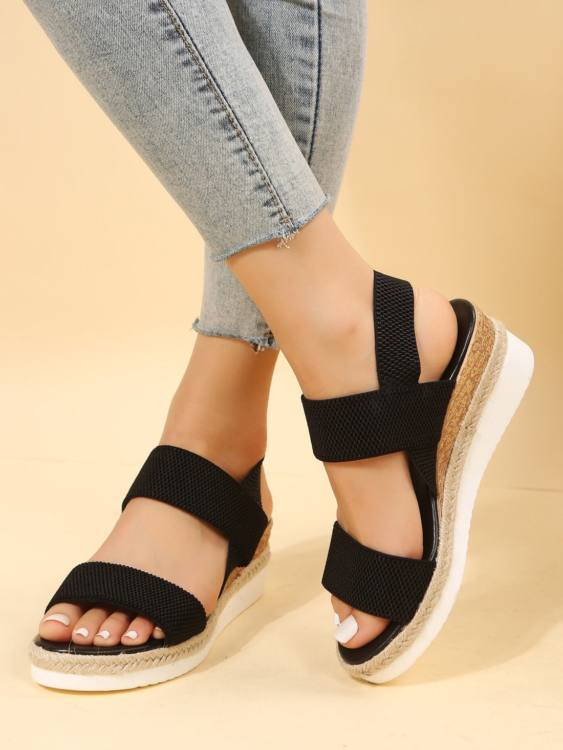 Women's slip-on crisscross wedge sandals with open toe, slingback strap, buckle detail, and mid wedge heel in a casual style.