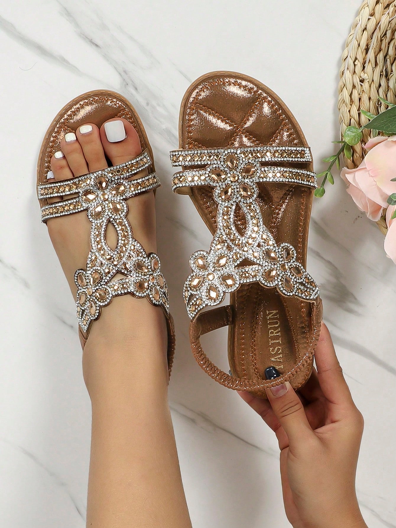Women’s metallic slingback flat sandals with rhinestone decor, open toe, and ankle strap in a bohemian outdoor style.