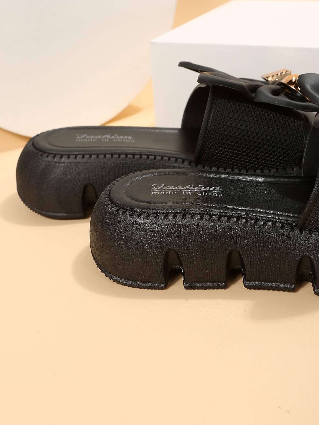 Women's plus size thick sole slip-on sandals with bowknot detail, open toe design, low heel, and PU leather upper.