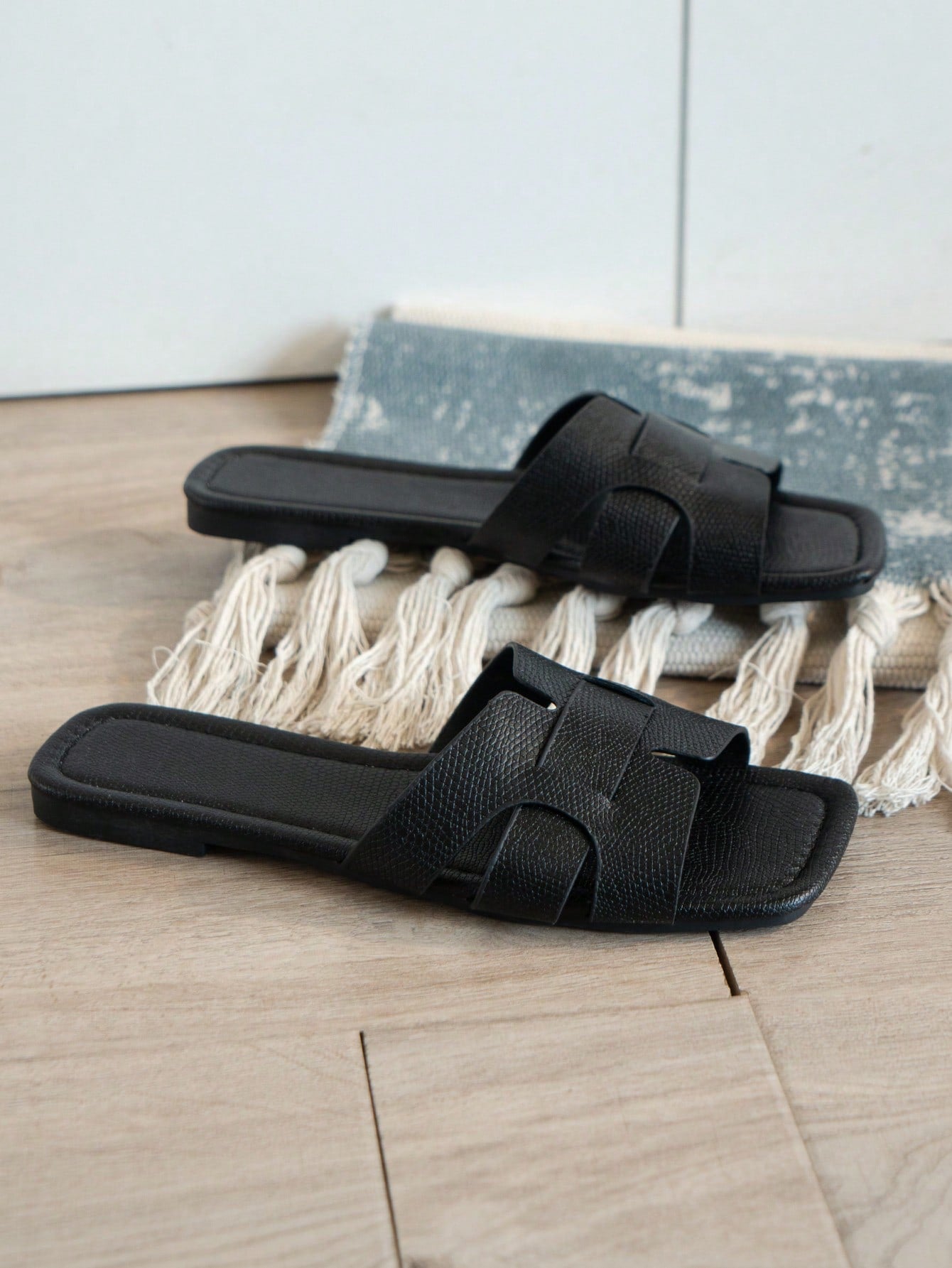 Women's Korean-style casual flat slide sandals with open toe, geometric detail, and pink color.