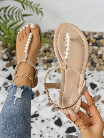 Women’s Roman style strap slide sandals with flat sole, buckle detail, and round toe, designed as casual slip-on beach and outdoor sandals.
