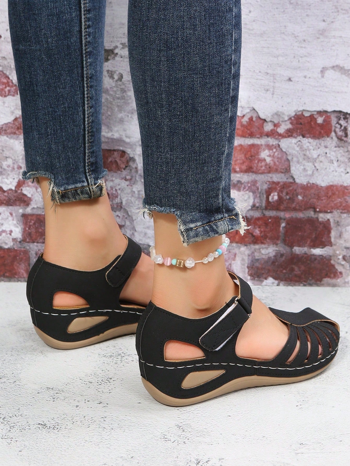 Women's classic wedge sandals with cut-out upper, ankle strap, hook-and-loop closure, round toe, and mid wedge heel for casual outdoor wear.