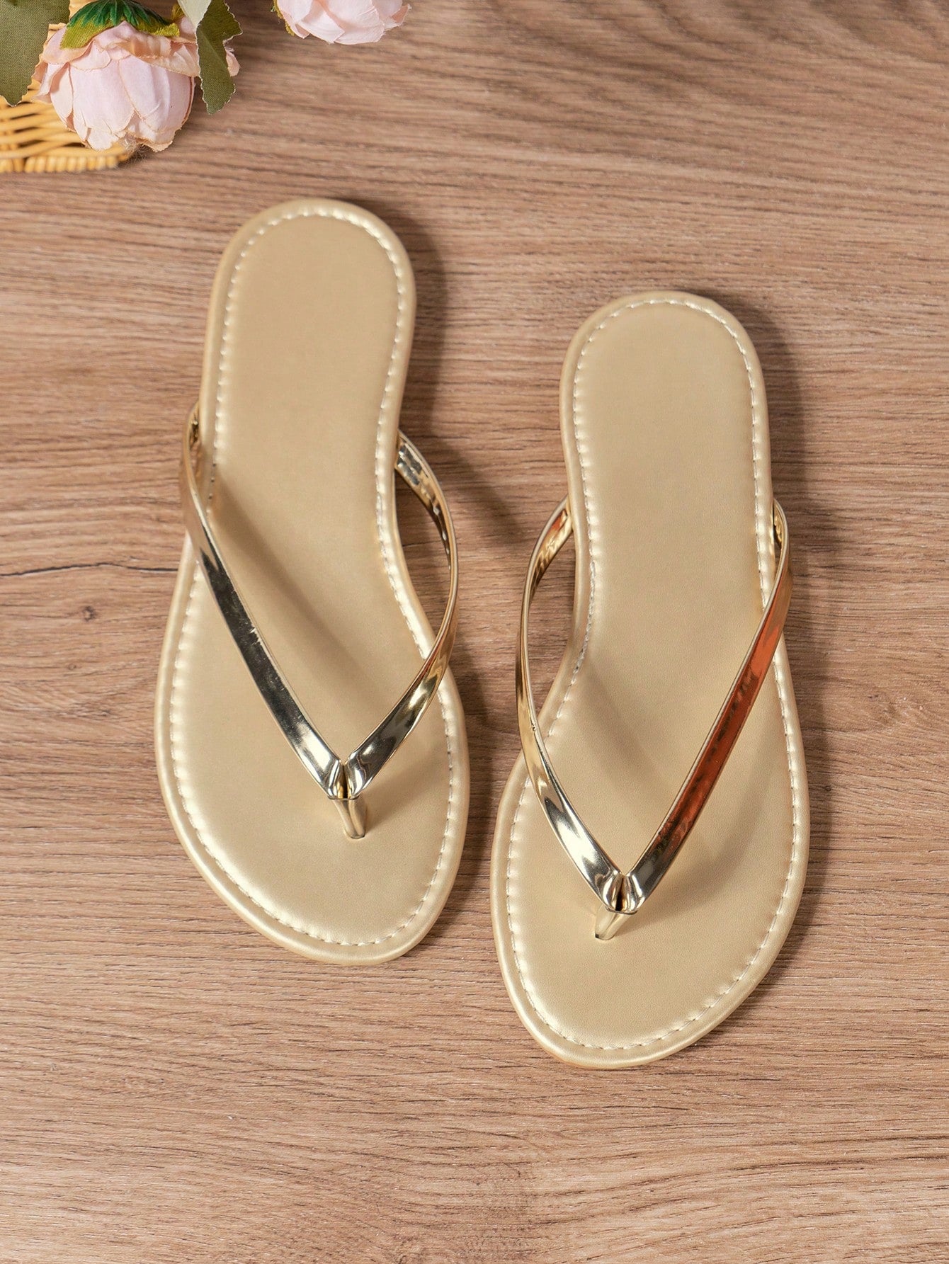 Women's criss cross thong flip flops with lace-up detail, flat sole, and non-slip outsole, suitable for beach, holiday, and casual walking wear.