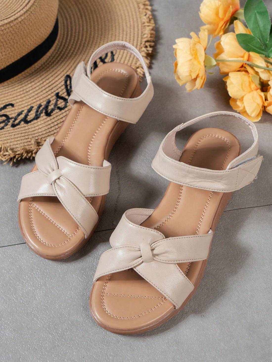 Women's apricot flat slide sandals with open toe, wide-width fit, soft sole, textured plain upper, and hook-and-loop strap closure