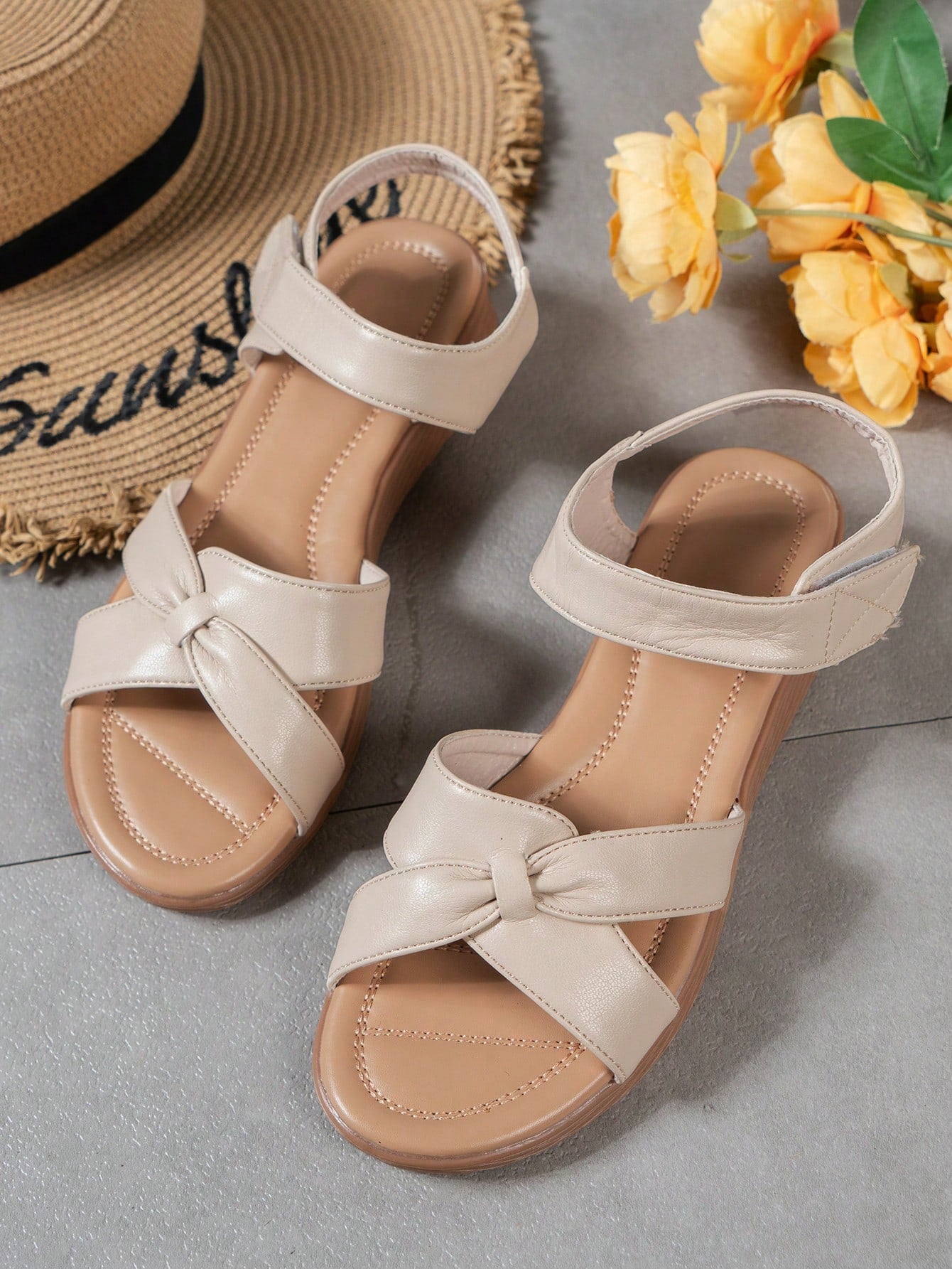 Women's apricot flat slide sandals with open toe, wide-width fit, soft sole, textured plain upper, and hook-and-loop strap closure