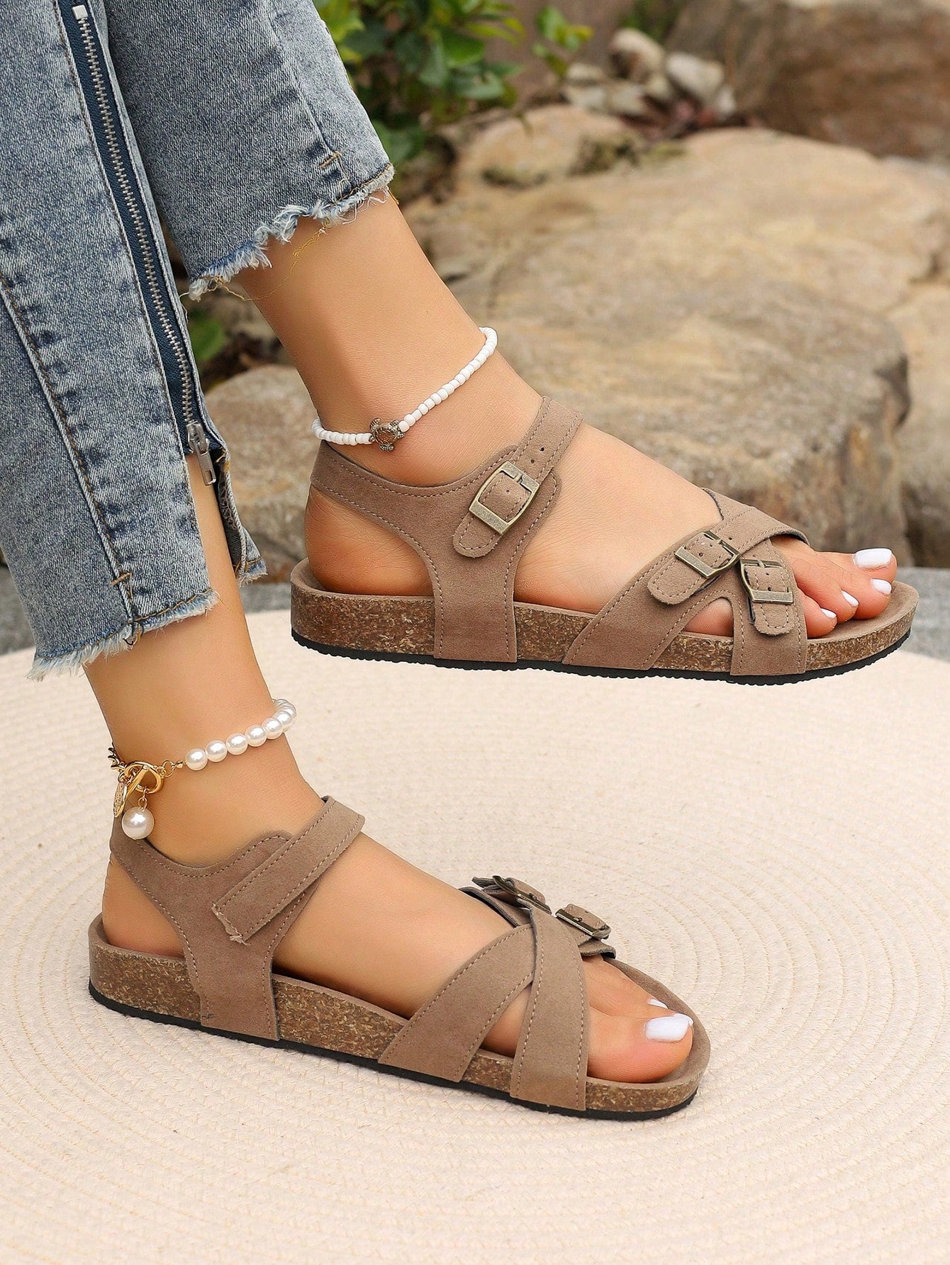 Women's plus size slip-on gladiator flat sandals with open toe and buckle detail, designed for beach and vacation wear.