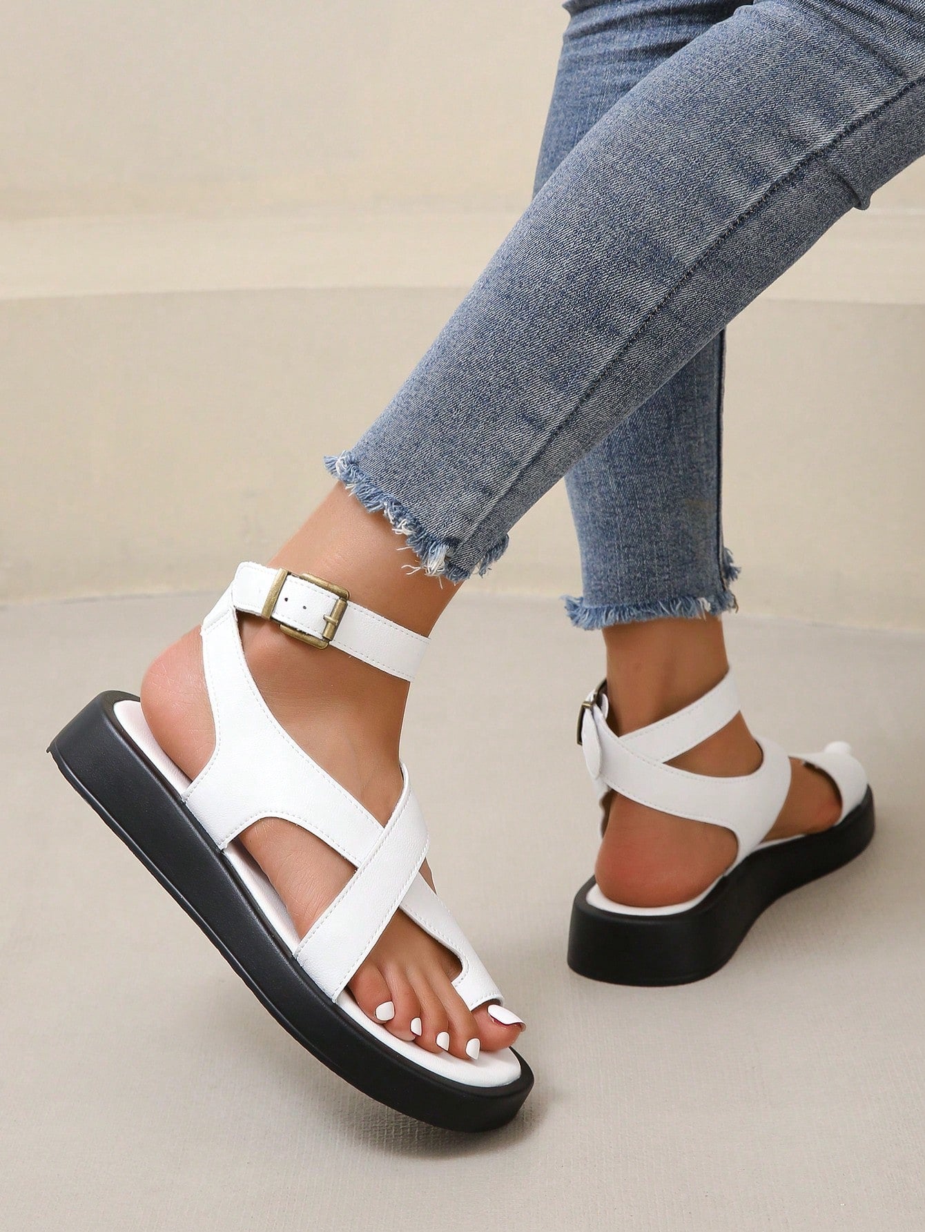 Women’s buckle decor ankle strap thong flat sandals in slingback style with open toe and plain bohemian design for outdoor summer wear.