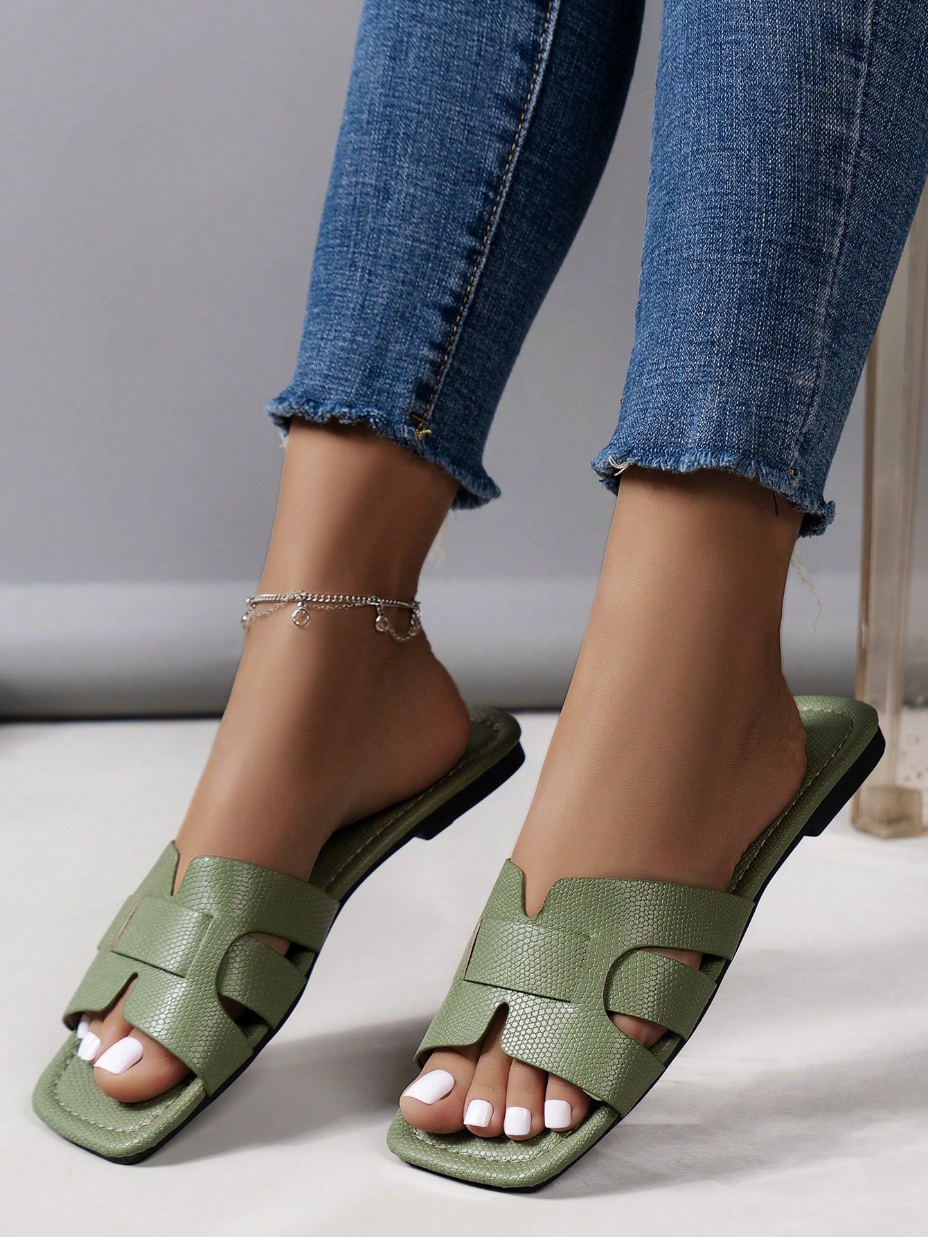Women's Korean-style casual flat slide sandals with open toe, geometric detail, and pink color.