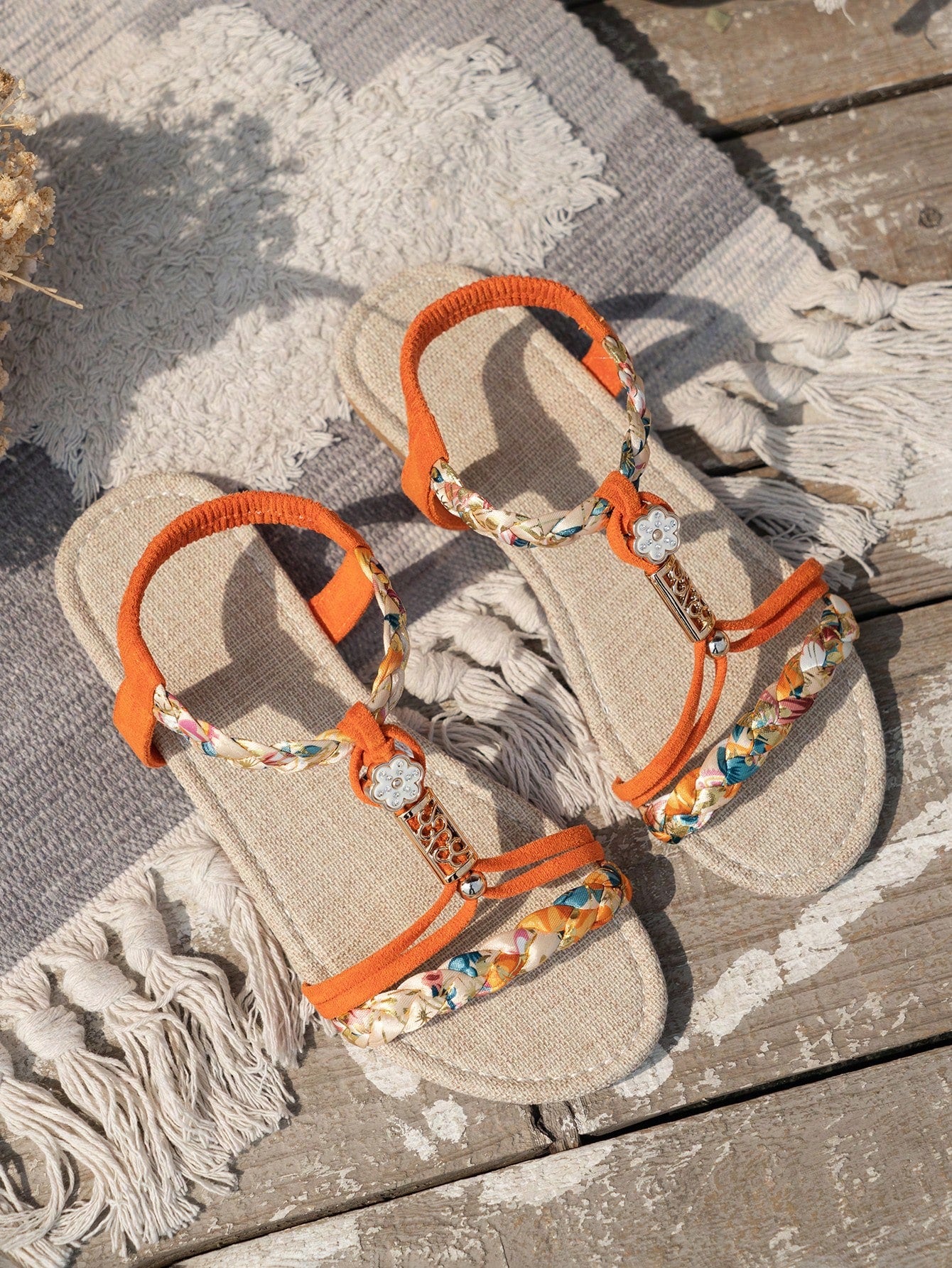 Women’s woven flat slingback sandals with braided straps and open toe design, boho-style beach and vacation footwear with a flat sole