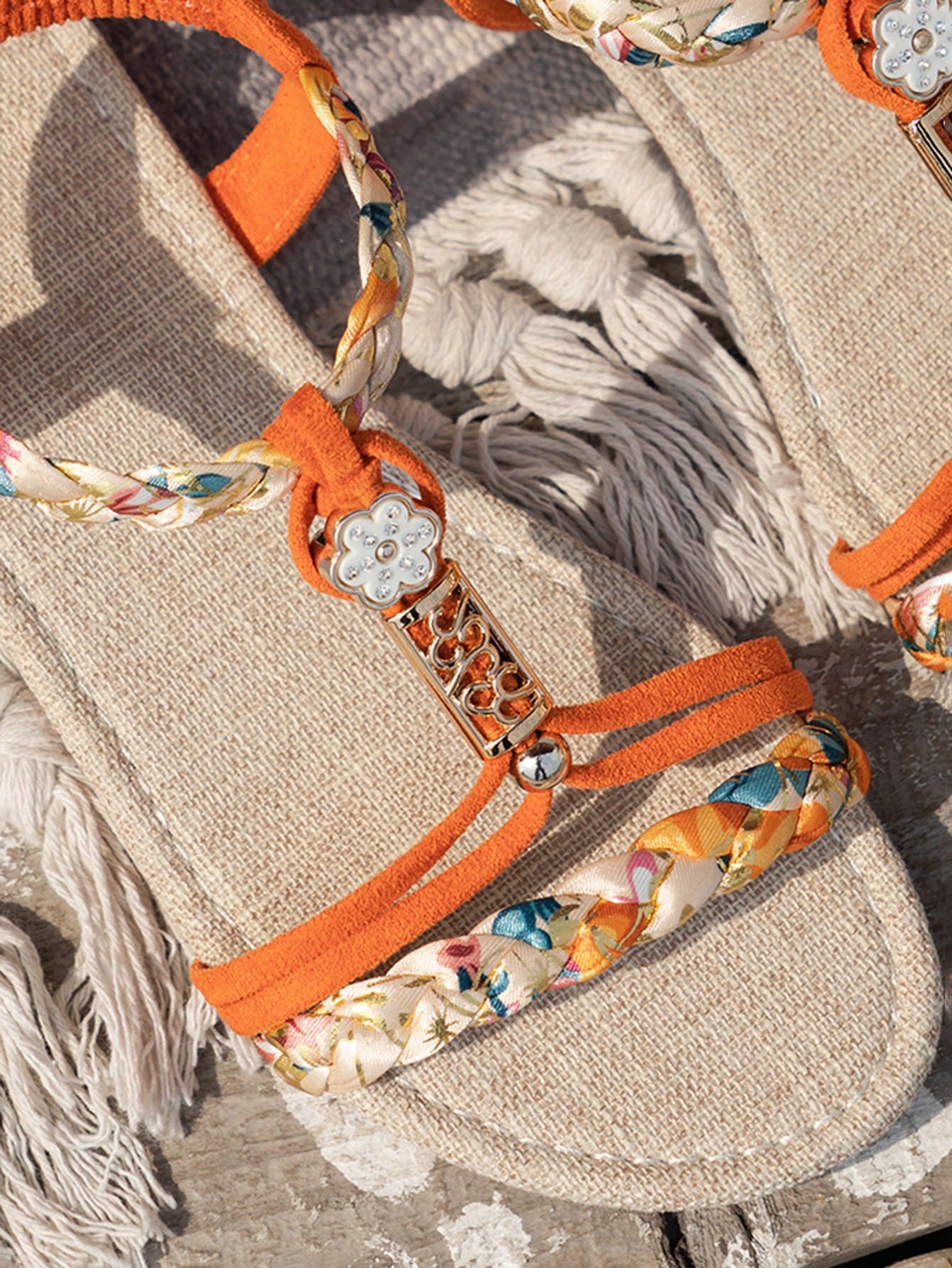 Women’s woven flat slingback sandals with braided straps and open toe design, boho-style beach and vacation footwear with a flat sole
