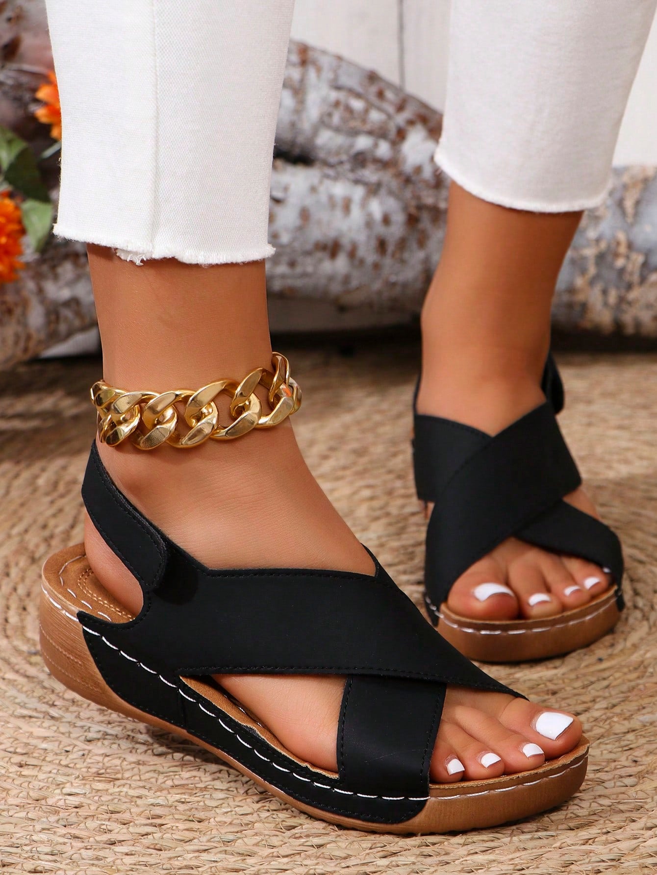 Women's open-toe wedge slide sandals with studded hollow-out upper, cross-over straps, buckle closure, and thick soft sole