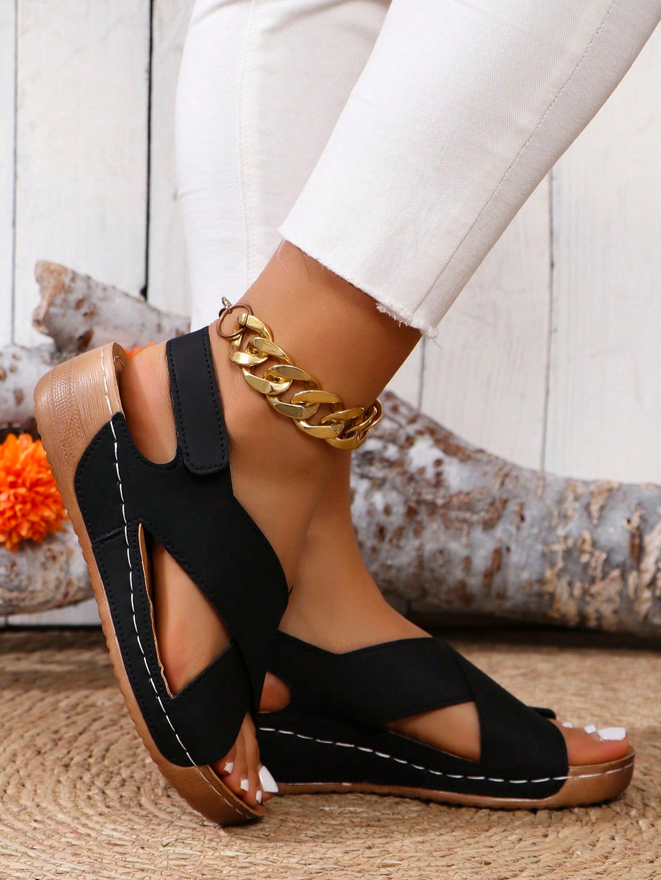 Women's open-toe wedge slide sandals with studded hollow-out upper, cross-over straps, buckle closure, and thick soft sole