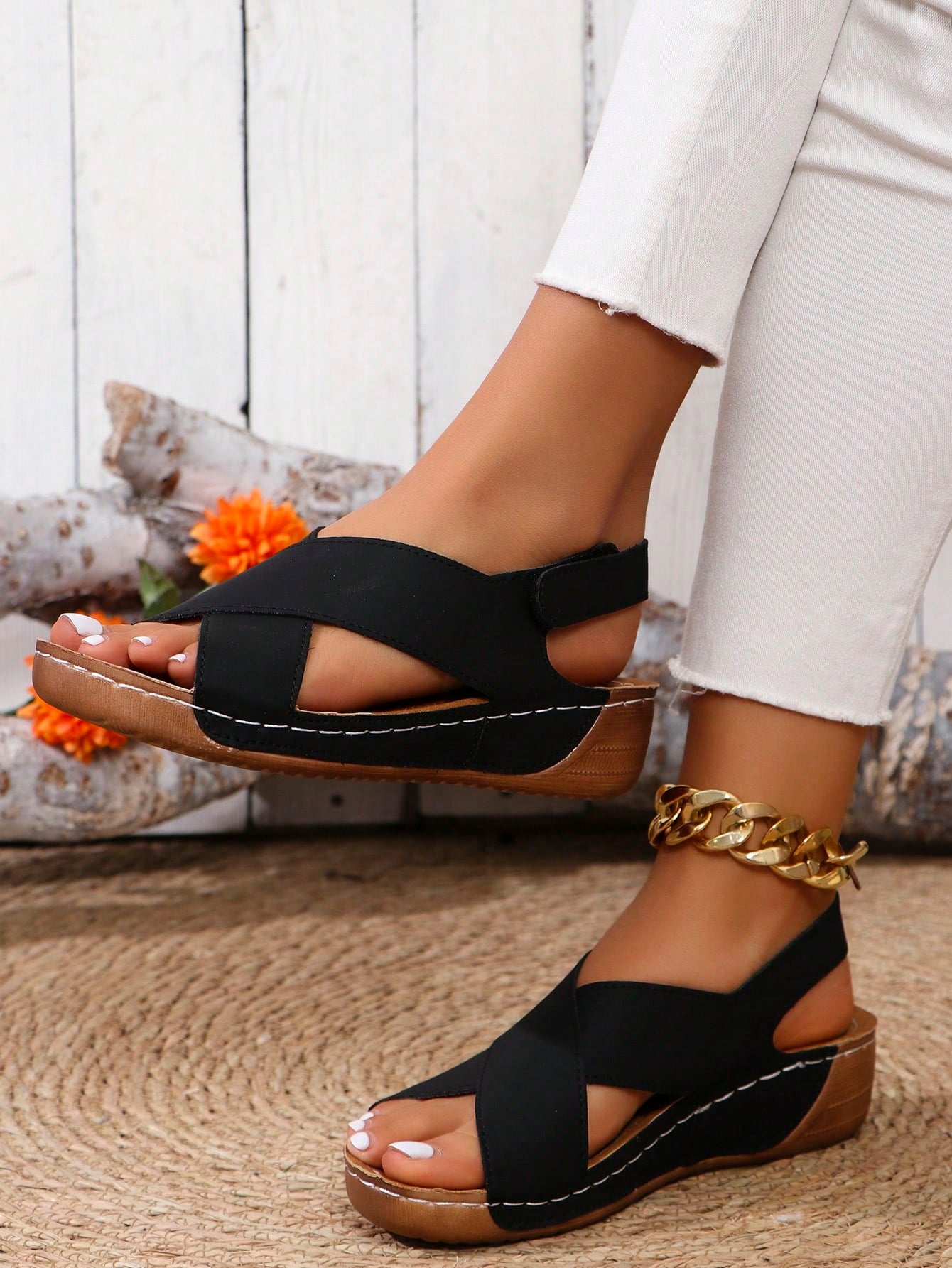 Women's open-toe wedge slide sandals with studded hollow-out upper, cross-over straps, buckle closure, and thick soft sole
