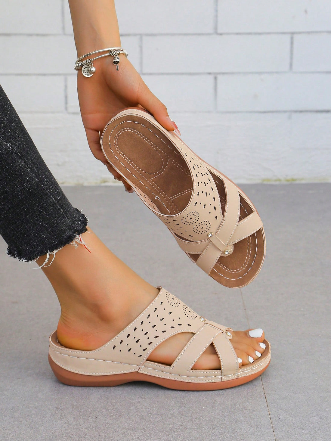 Women's retro wedge platform slide sandals with open toe and laser cut hollow-out upper, slip-on design, and mid heel for spring and summer beach outfits.