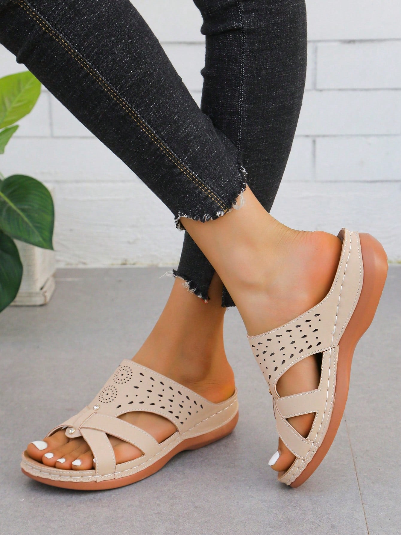 Women's retro wedge platform slide sandals with open toe and laser cut hollow-out upper, slip-on design, and mid heel for spring and summer beach outfits.