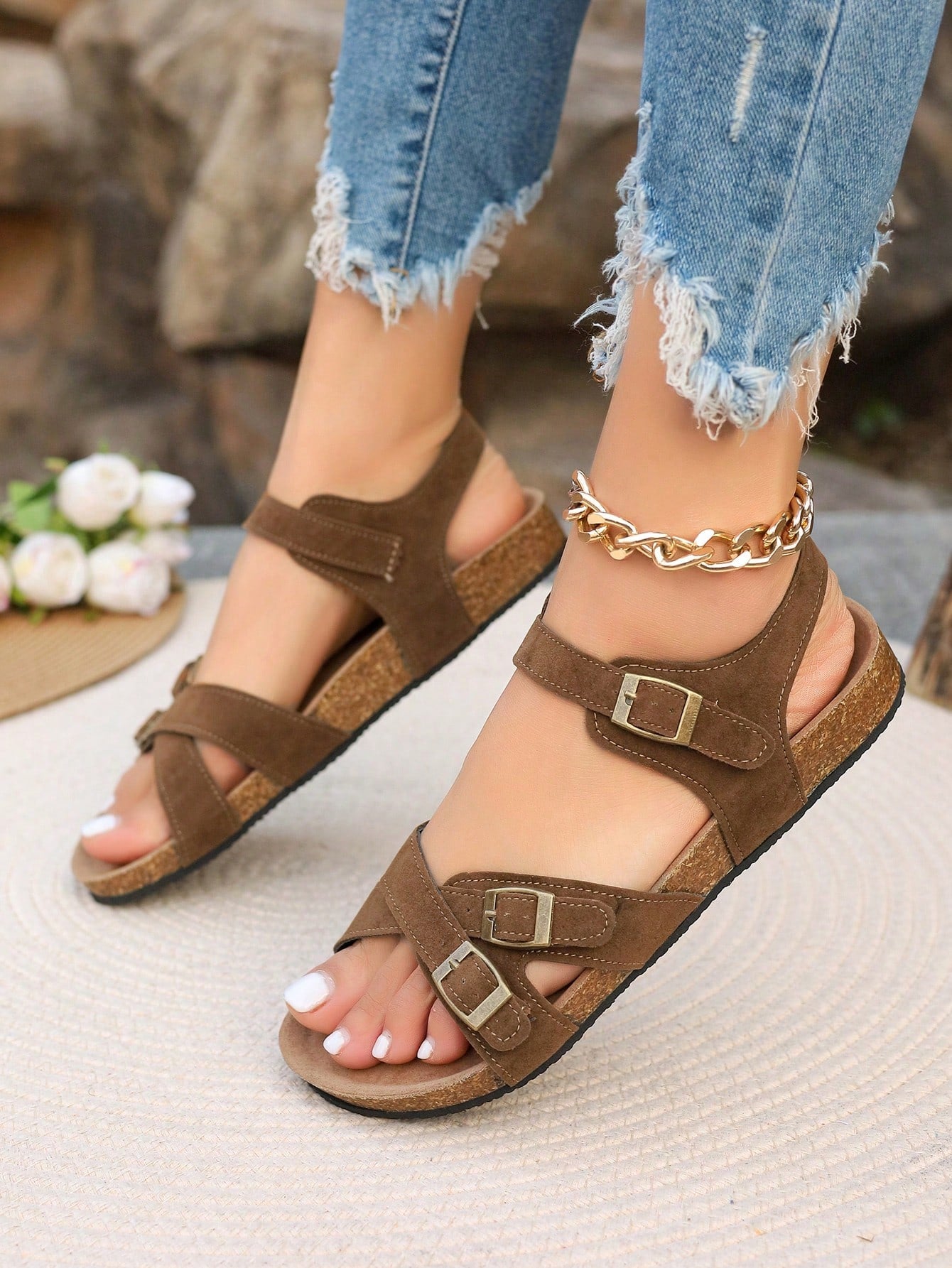 Women's plus size slip-on gladiator flat sandals with open toe and buckle detail, designed for beach and vacation wear.