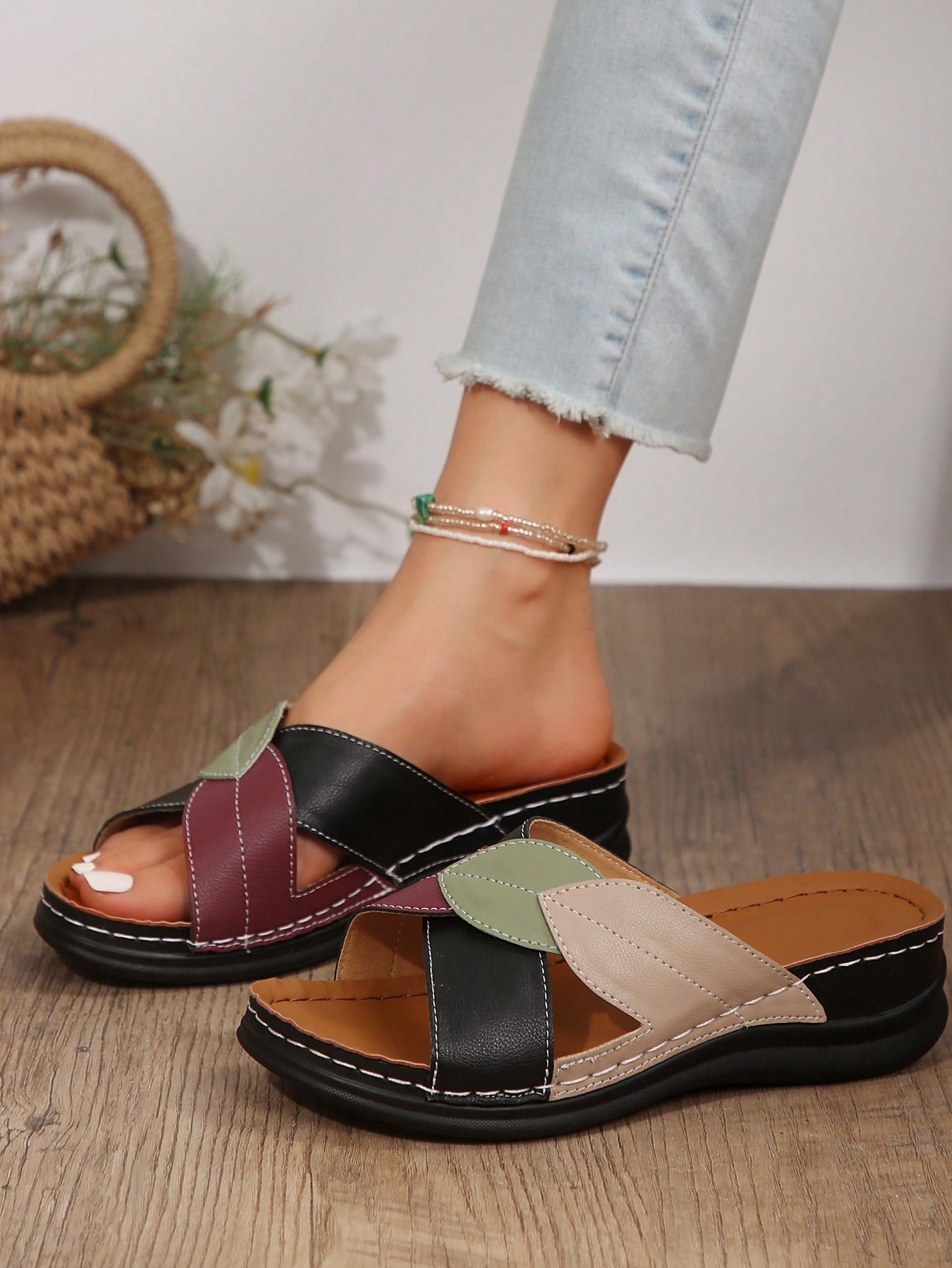 Women's multicolor wedge slide sandals with open toe, criss-cross straps, cut-out details, slip-on closure, and mid chunky wedge heel.