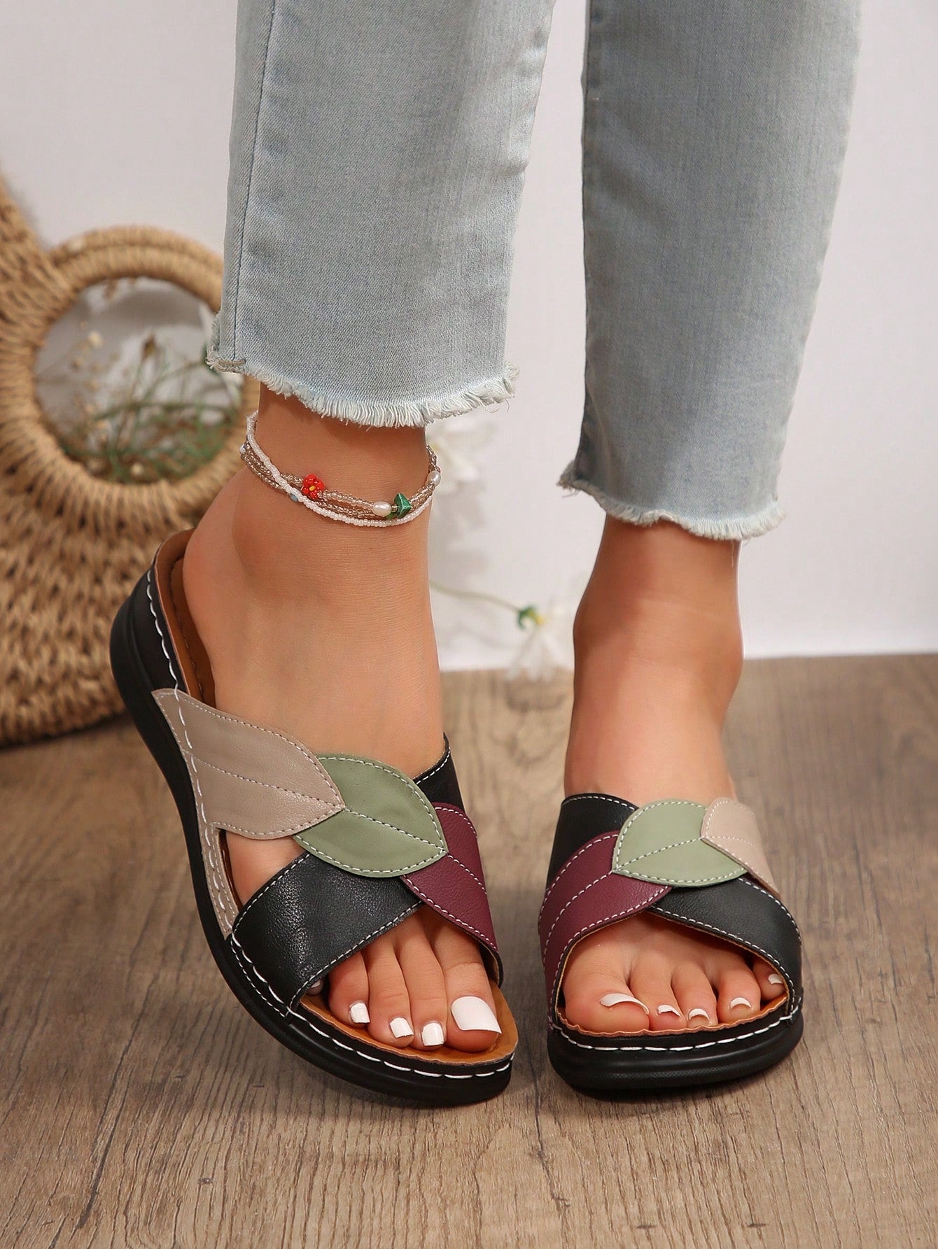 Women's multicolor wedge slide sandals with open toe, criss-cross straps, cut-out details, slip-on closure, and mid chunky wedge heel.