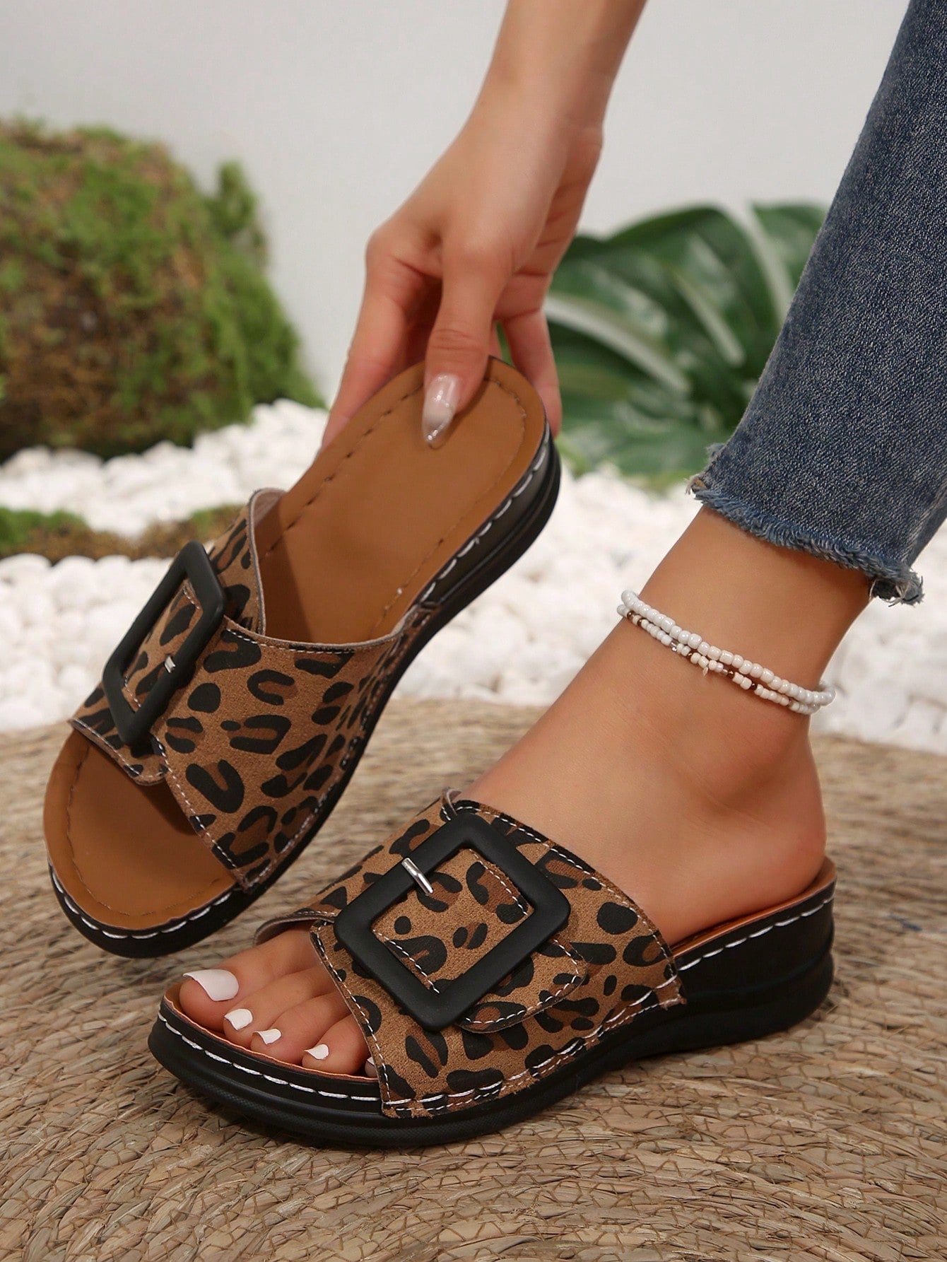 Women's multicolor wedge slide sandals with open toe, criss-cross straps, cut-out details, slip-on closure, and mid chunky wedge heel.