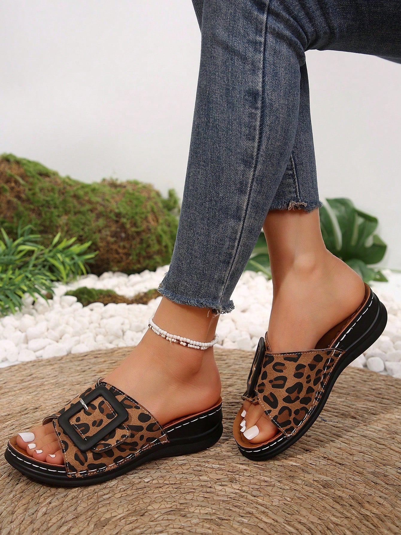 Women's multicolor wedge slide sandals with open toe, criss-cross straps, cut-out details, slip-on closure, and mid chunky wedge heel.
