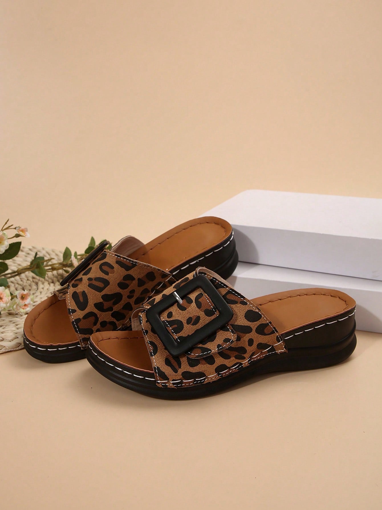 Women's multicolor wedge slide sandals with open toe, criss-cross straps, cut-out details, slip-on closure, and mid chunky wedge heel.