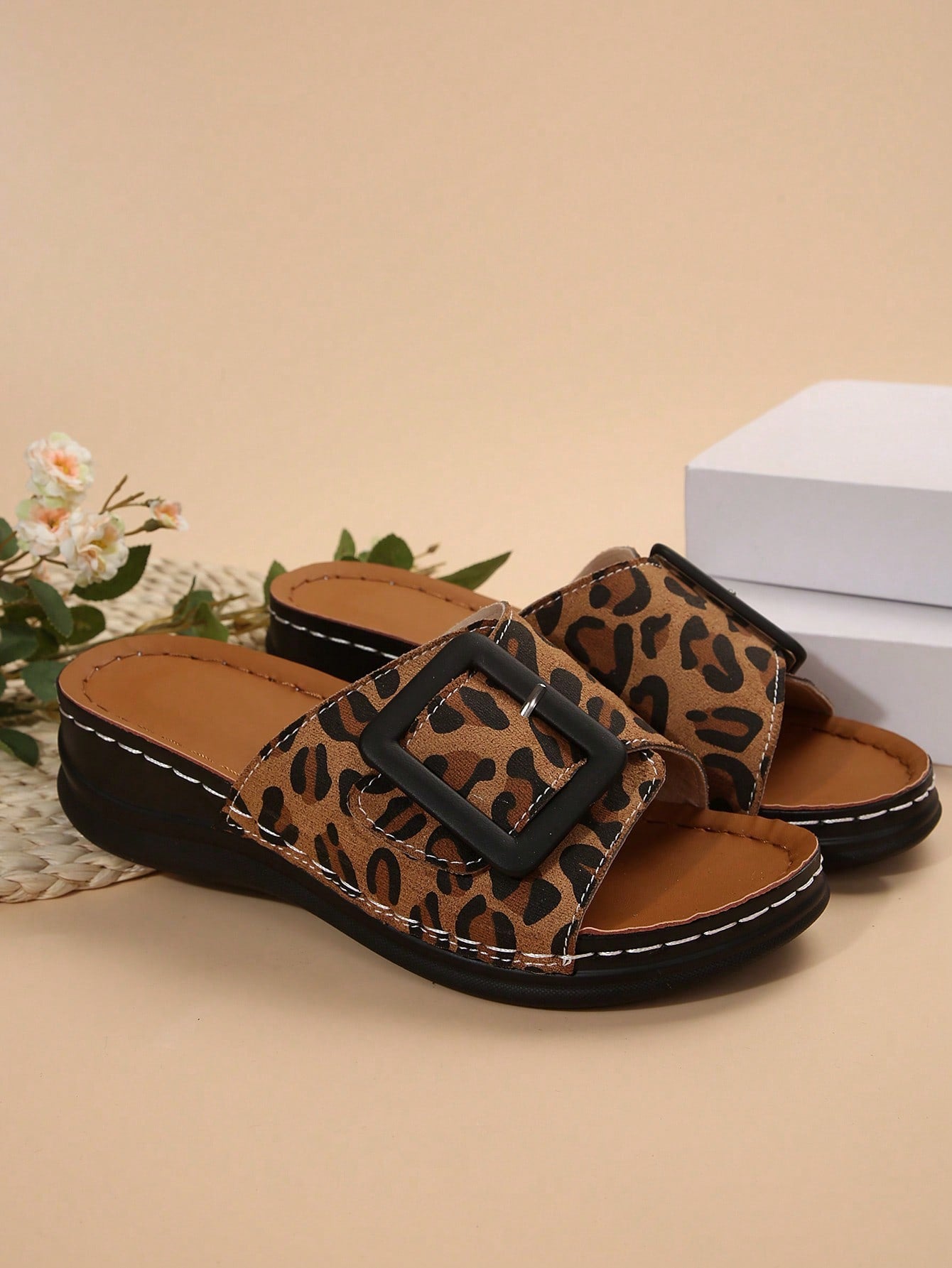Women's multicolor wedge slide sandals with open toe, criss-cross straps, cut-out details, slip-on closure, and mid chunky wedge heel.