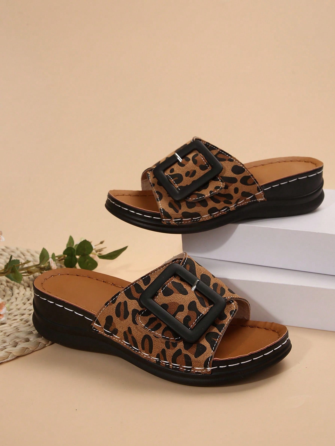 Women's multicolor wedge slide sandals with open toe, criss-cross straps, cut-out details, slip-on closure, and mid chunky wedge heel.