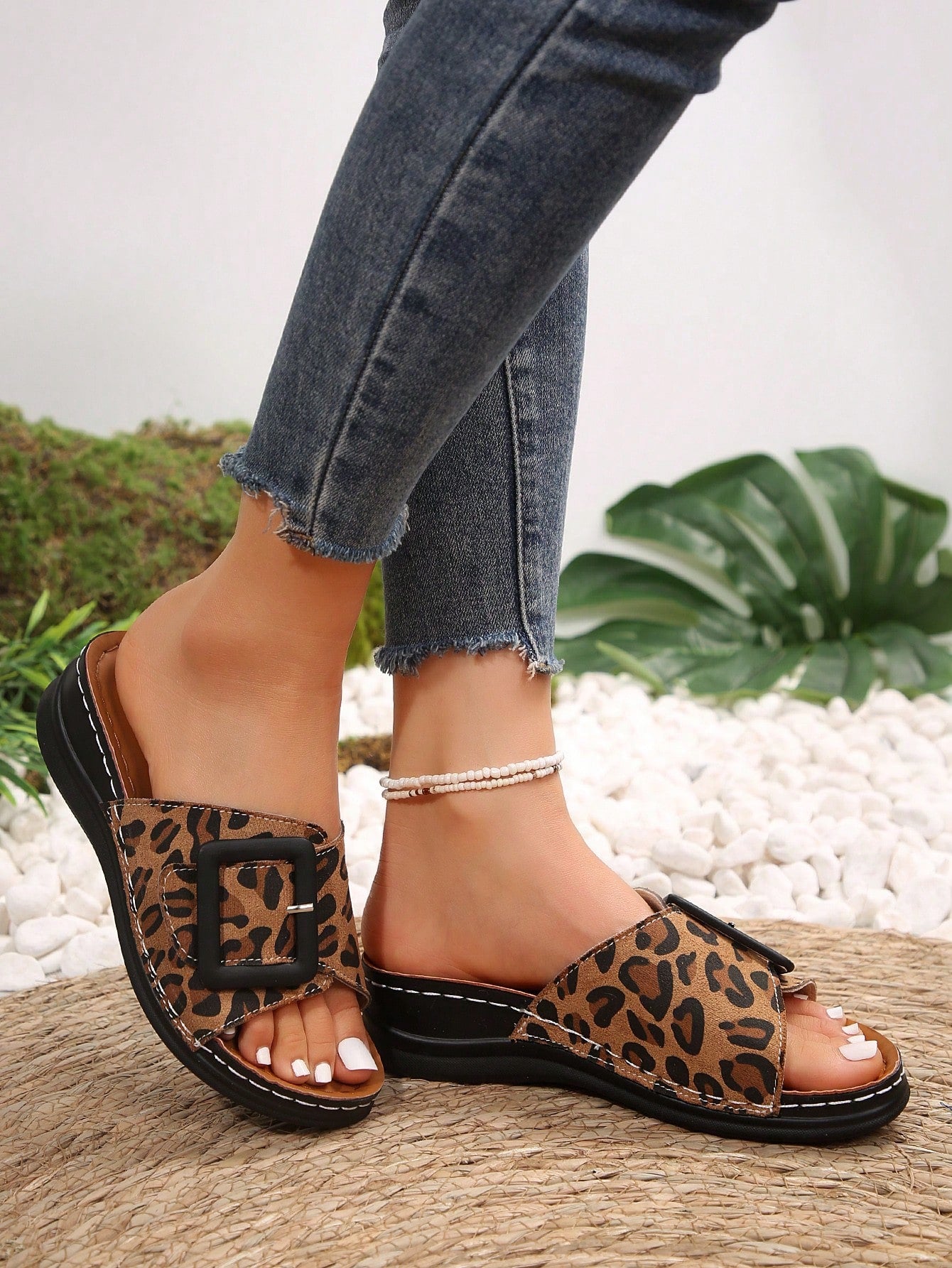 Women's multicolor wedge slide sandals with open toe, criss-cross straps, cut-out details, slip-on closure, and mid chunky wedge heel.