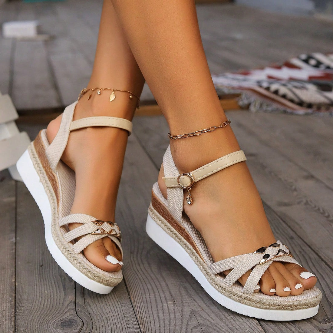 Women’s open-toe wedge sandals with a woven platform-style sole, ankle buckle strap, and mid heel, shown in a casual outdoor style.