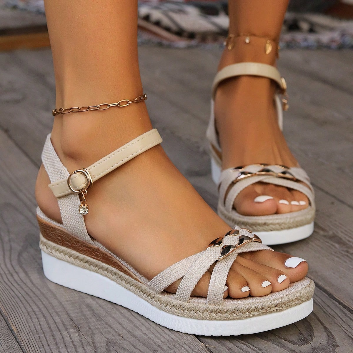 Women’s open-toe wedge sandals with a woven platform-style sole, ankle buckle strap, and mid heel, shown in a casual outdoor style.