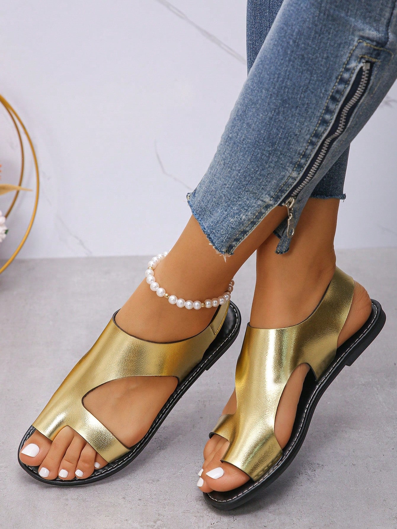 Women's flat slide sandals with toe ring toe-post design and hook-and-loop detail, suitable for summer outdoor wear.