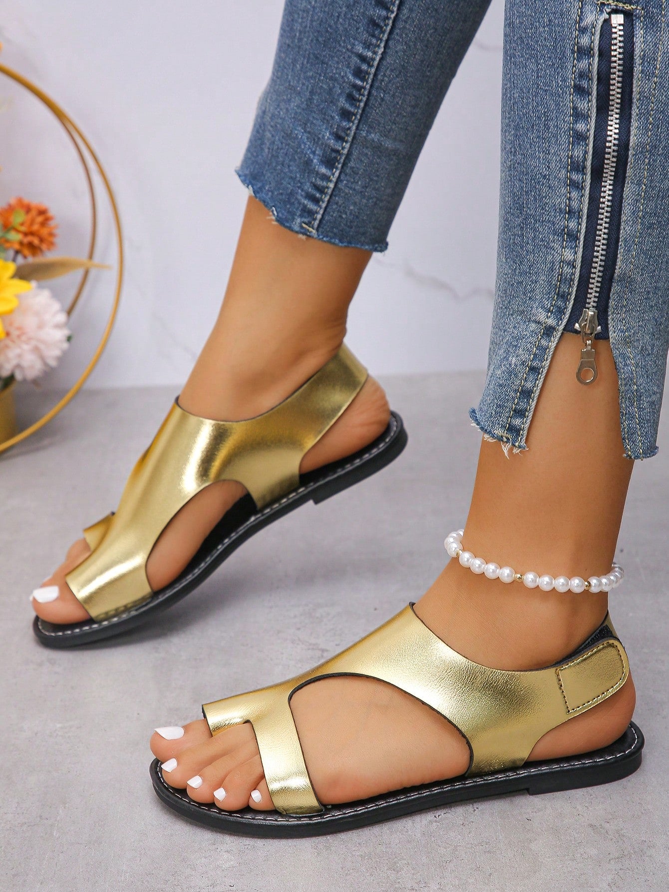Women's flat slide sandals with toe ring toe-post design and hook-and-loop detail, suitable for summer outdoor wear.