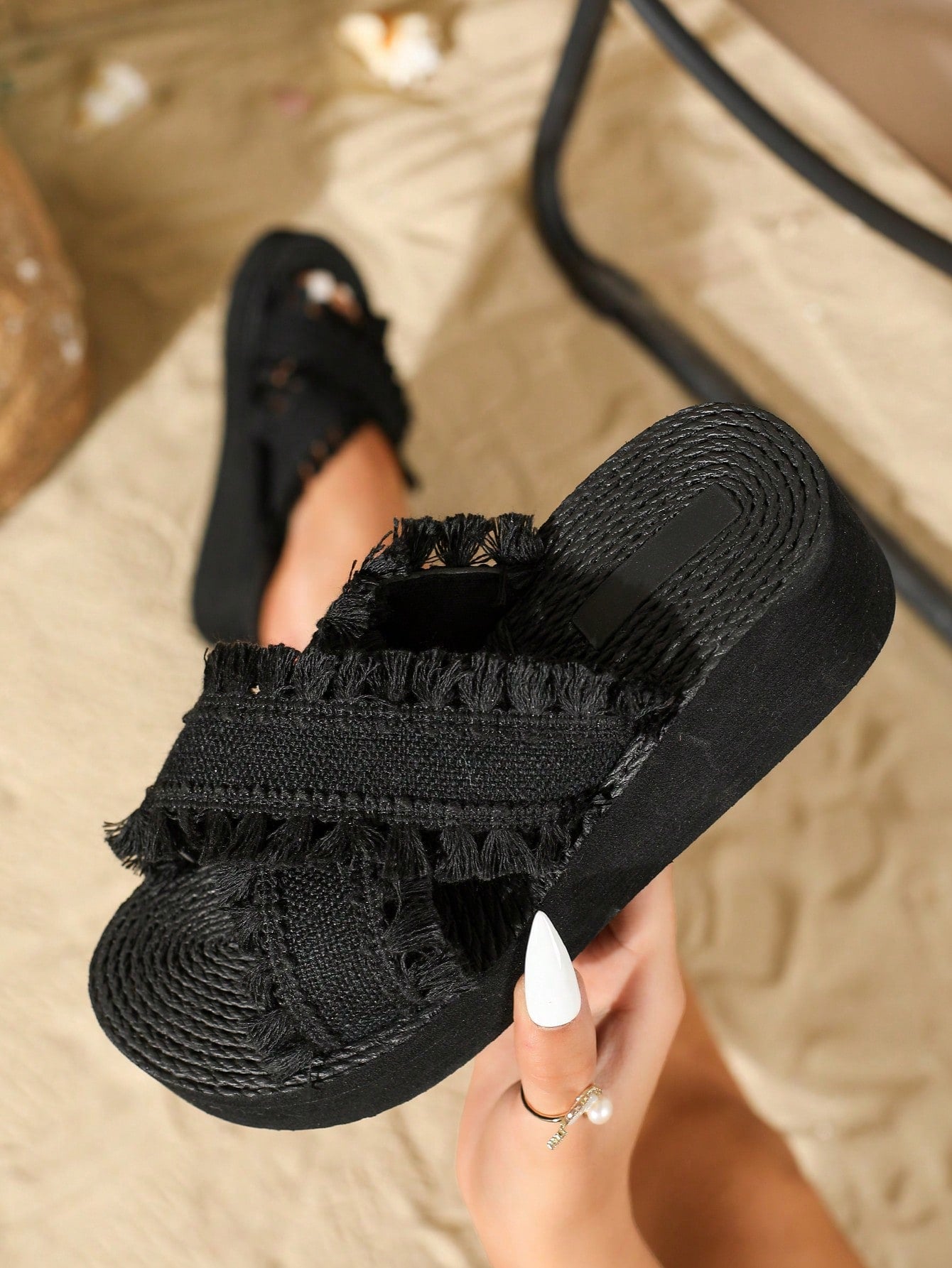 Women's beige slip-on platform wedge slide sandals with open toe, tassel and ruffle details, rope-pattern styling, and mid heel.