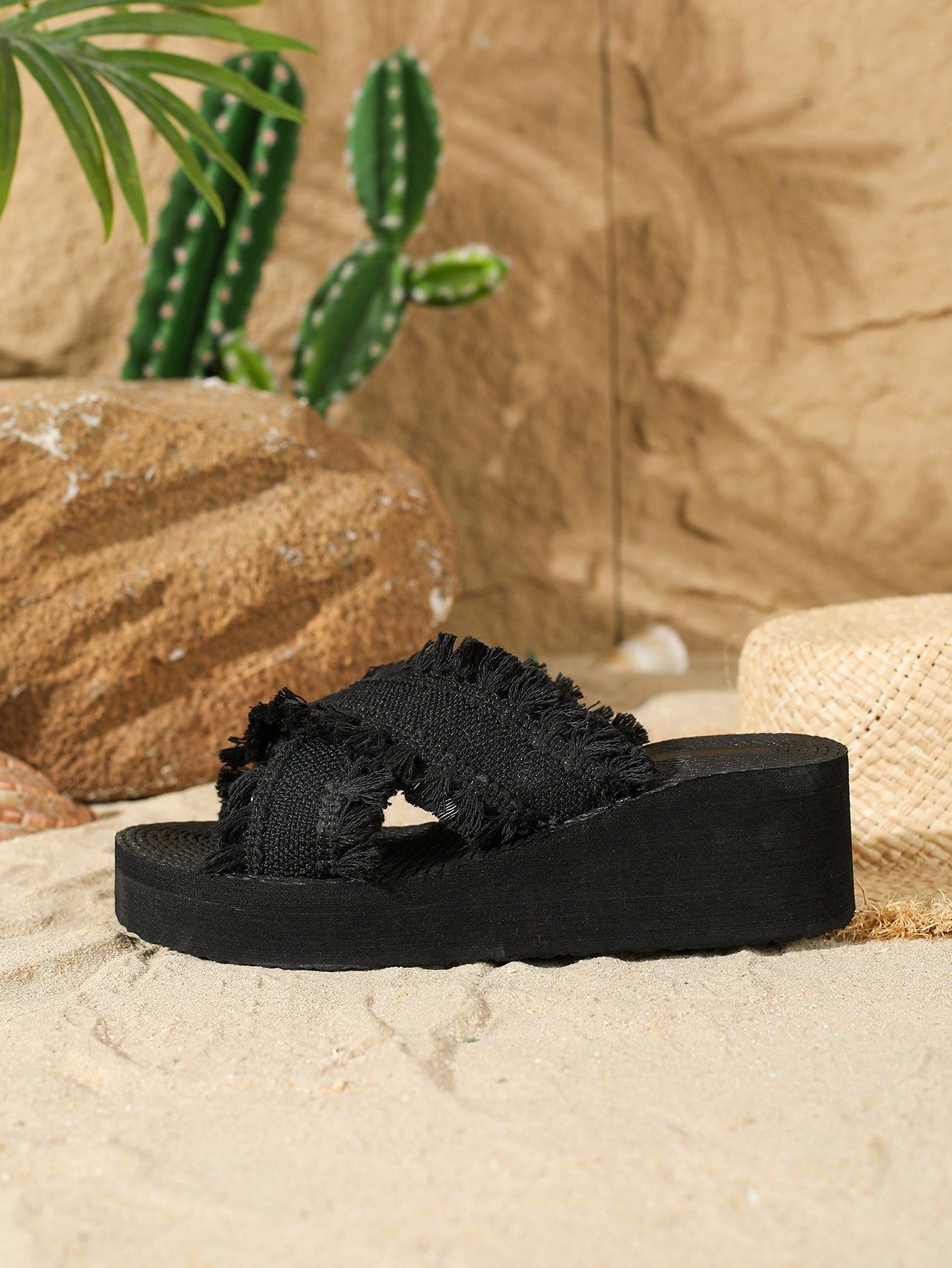 Women's beige slip-on platform wedge slide sandals with open toe, tassel and ruffle details, rope-pattern styling, and mid heel.
