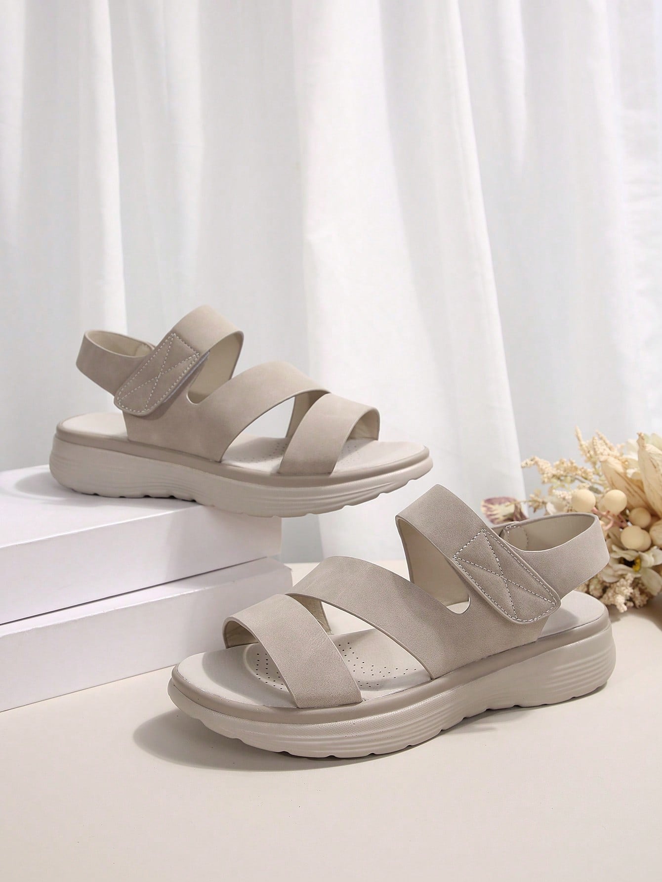 Women's plus size platform wedge sandals with hook-and-loop closure, open toe, ankle strap, and cut-out detailing in a casual beach style.