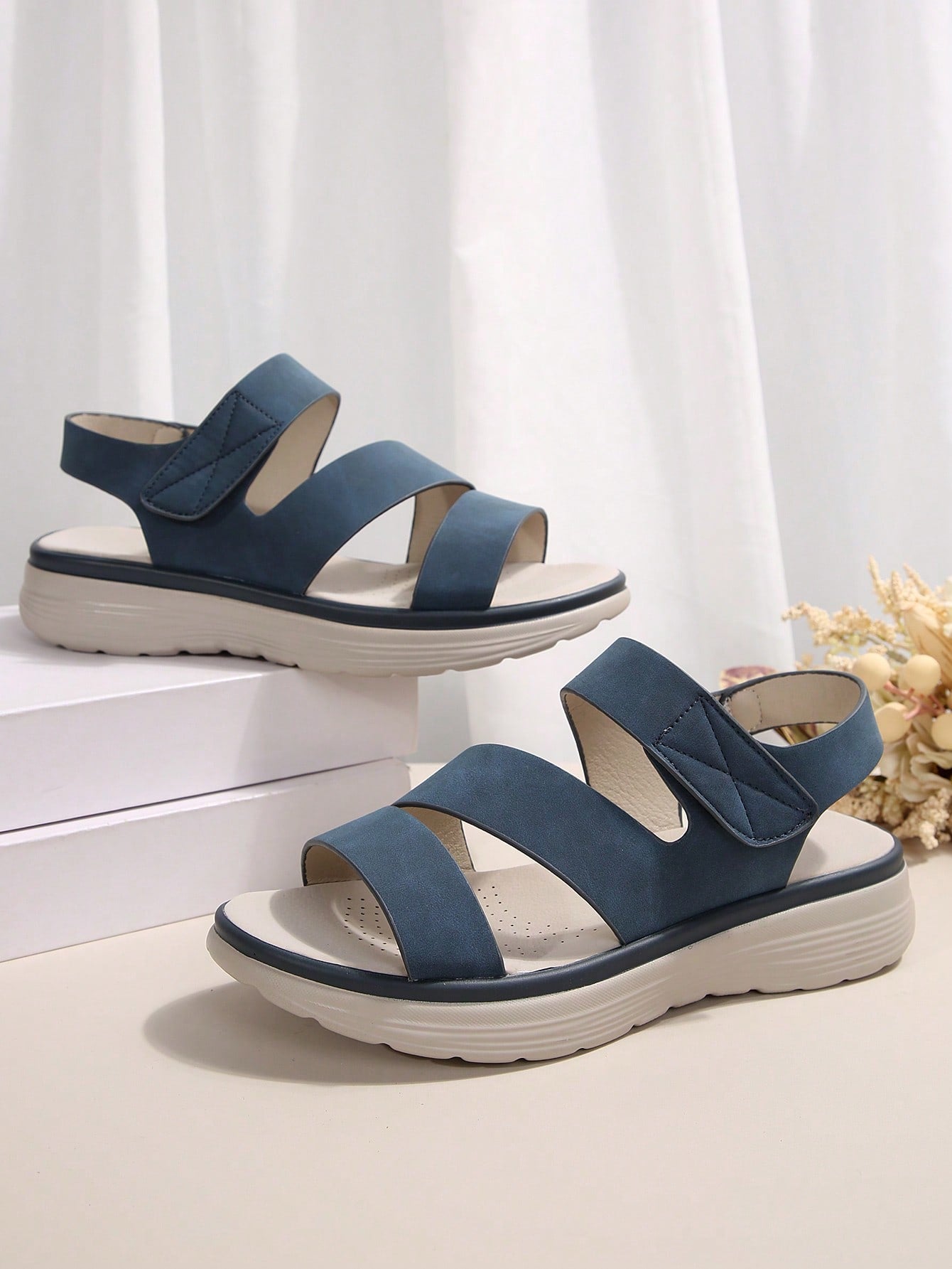 Women's plus size platform wedge sandals with hook-and-loop closure, open toe, ankle strap, and cut-out detailing in a casual beach style.