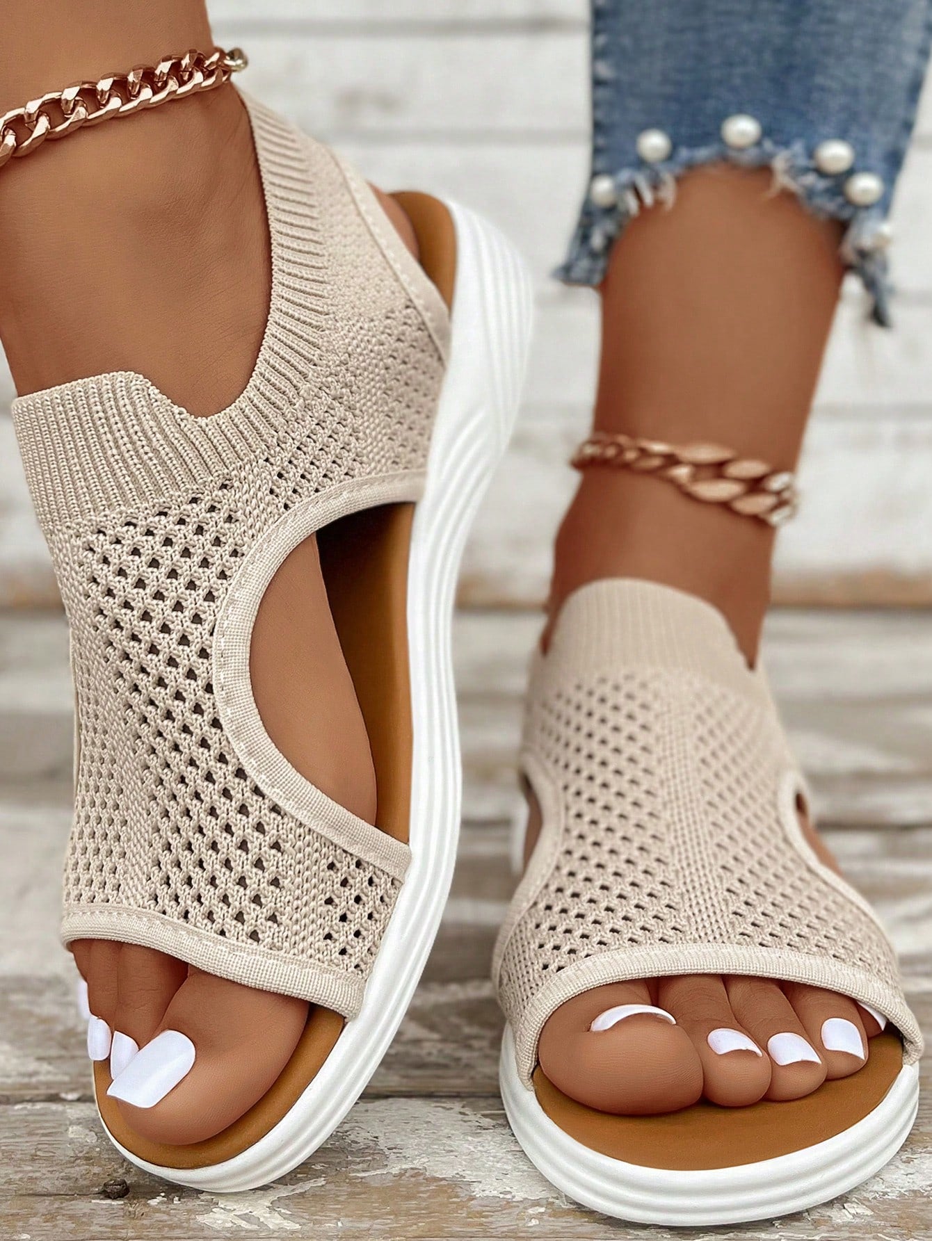 Plus size women's slip-on wedge slide sandals with open toe, low platform heel, and breathable cutout fabric upper, shown as a casual outdoor style sandal.