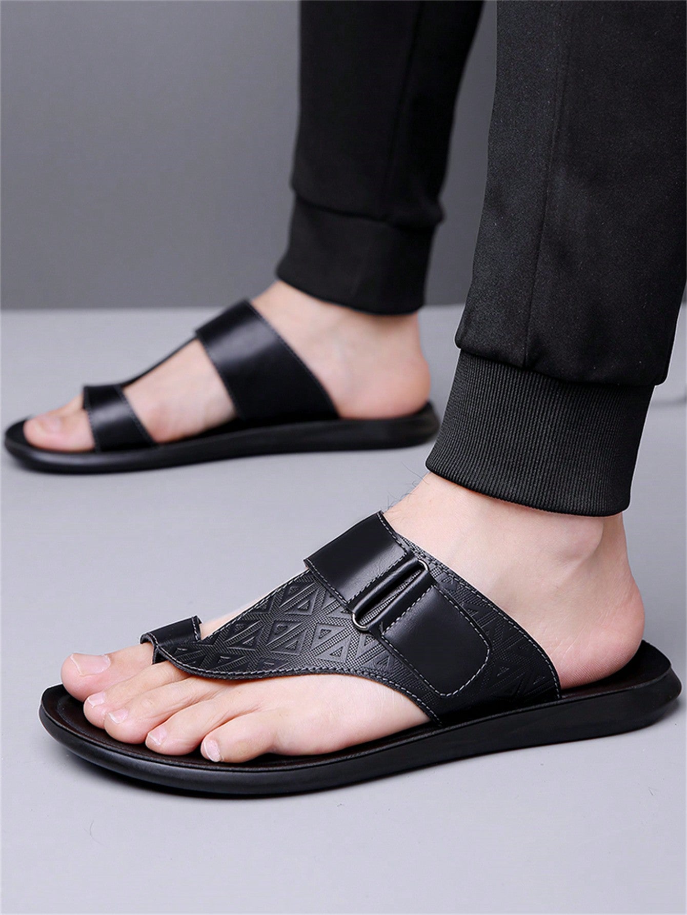 Men's summer beach slippers featuring a toe post, hook-and-loop detail, soft molded sole, and anti-skid outsole for casual outdoor wear.