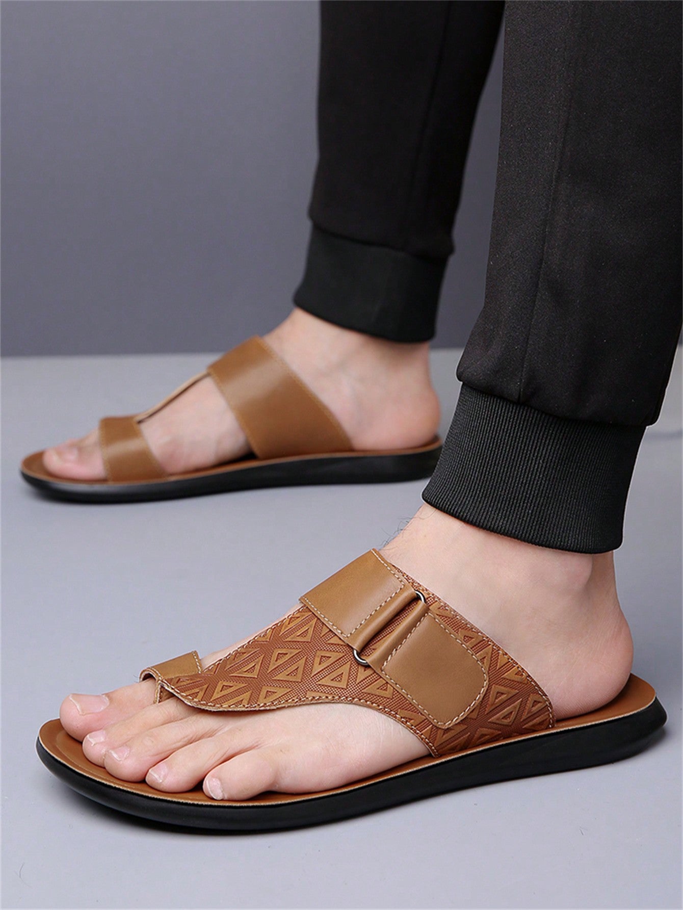 Men's summer beach slippers featuring a toe post, hook-and-loop detail, soft molded sole, and anti-skid outsole for casual outdoor wear.