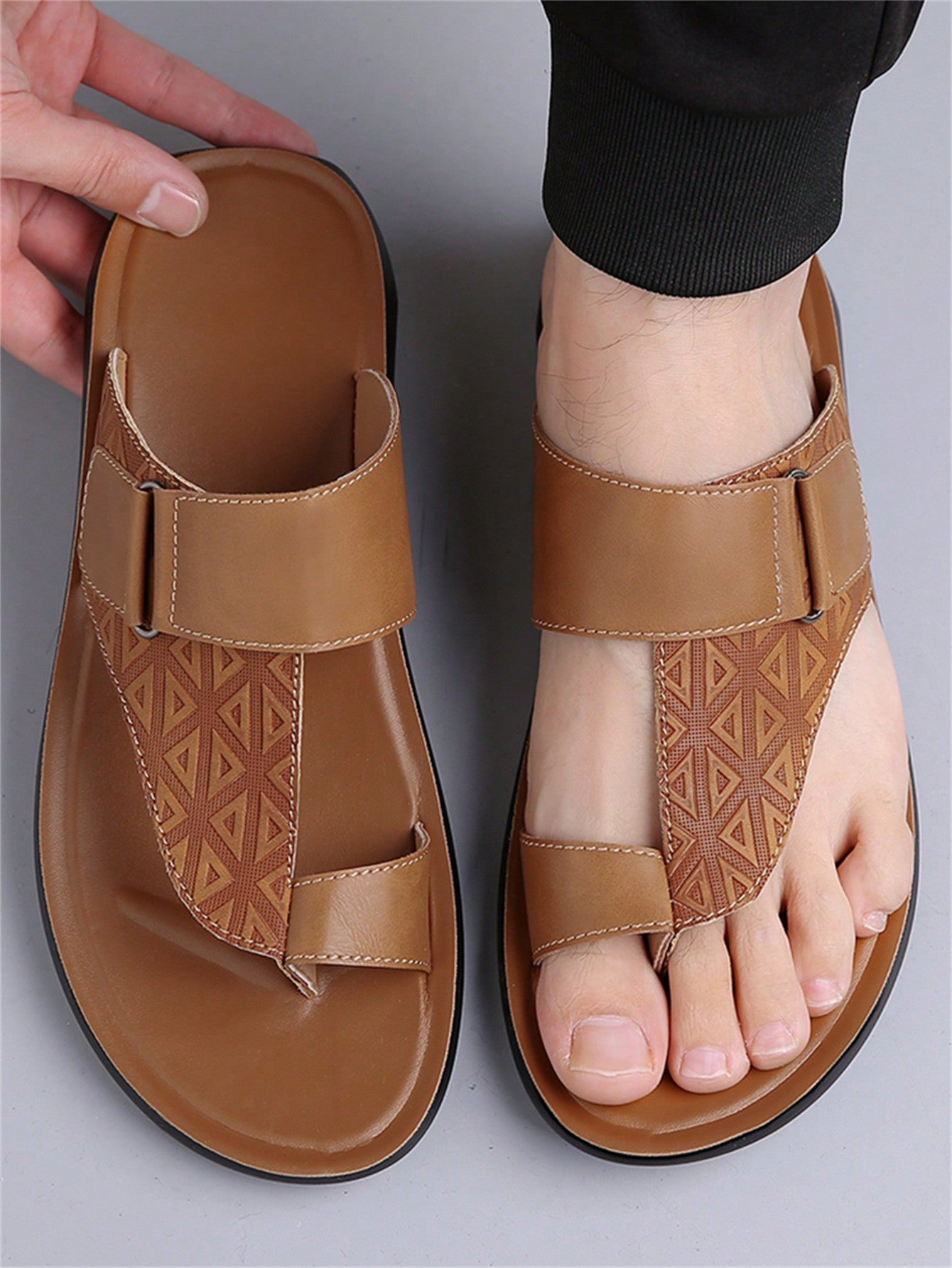 Men's summer beach slippers featuring a toe post, hook-and-loop detail, soft molded sole, and anti-skid outsole for casual outdoor wear.