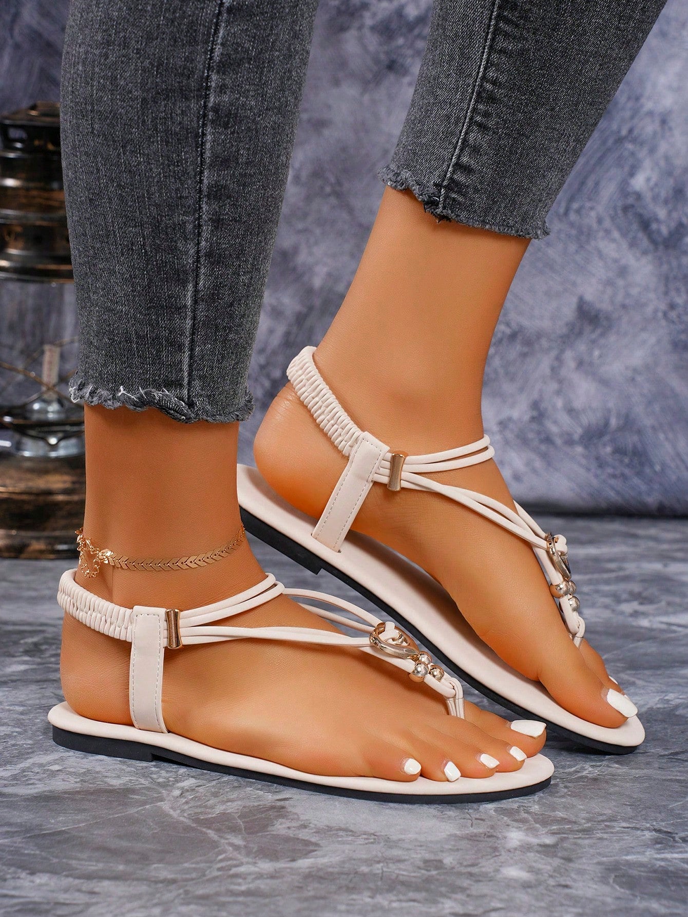 Women's slip-on flat gladiator sandals with beaded detail and toe post design