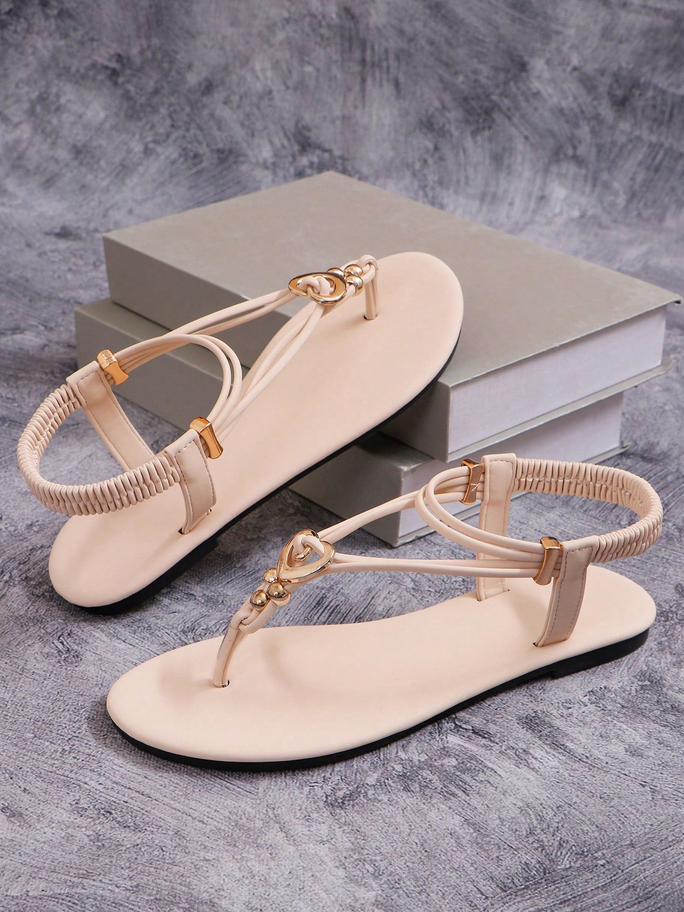 Women's slip-on flat gladiator sandals with beaded detail and toe post design